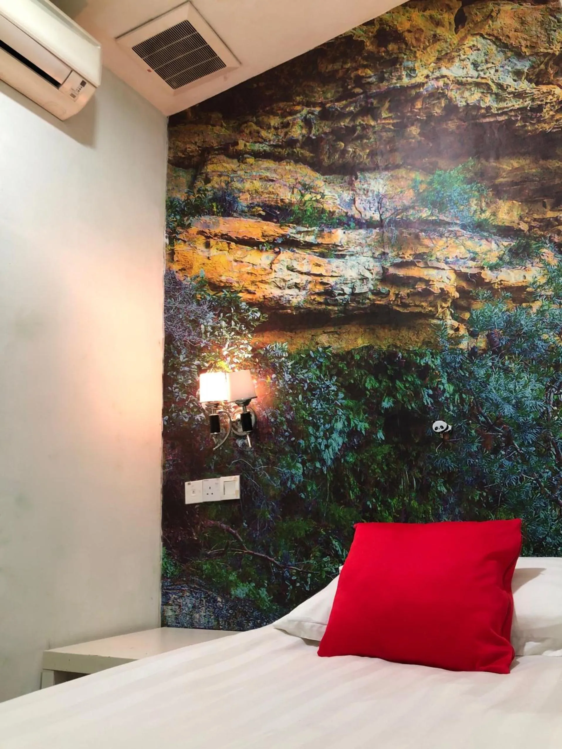 Bed in Rain Forest Hotel