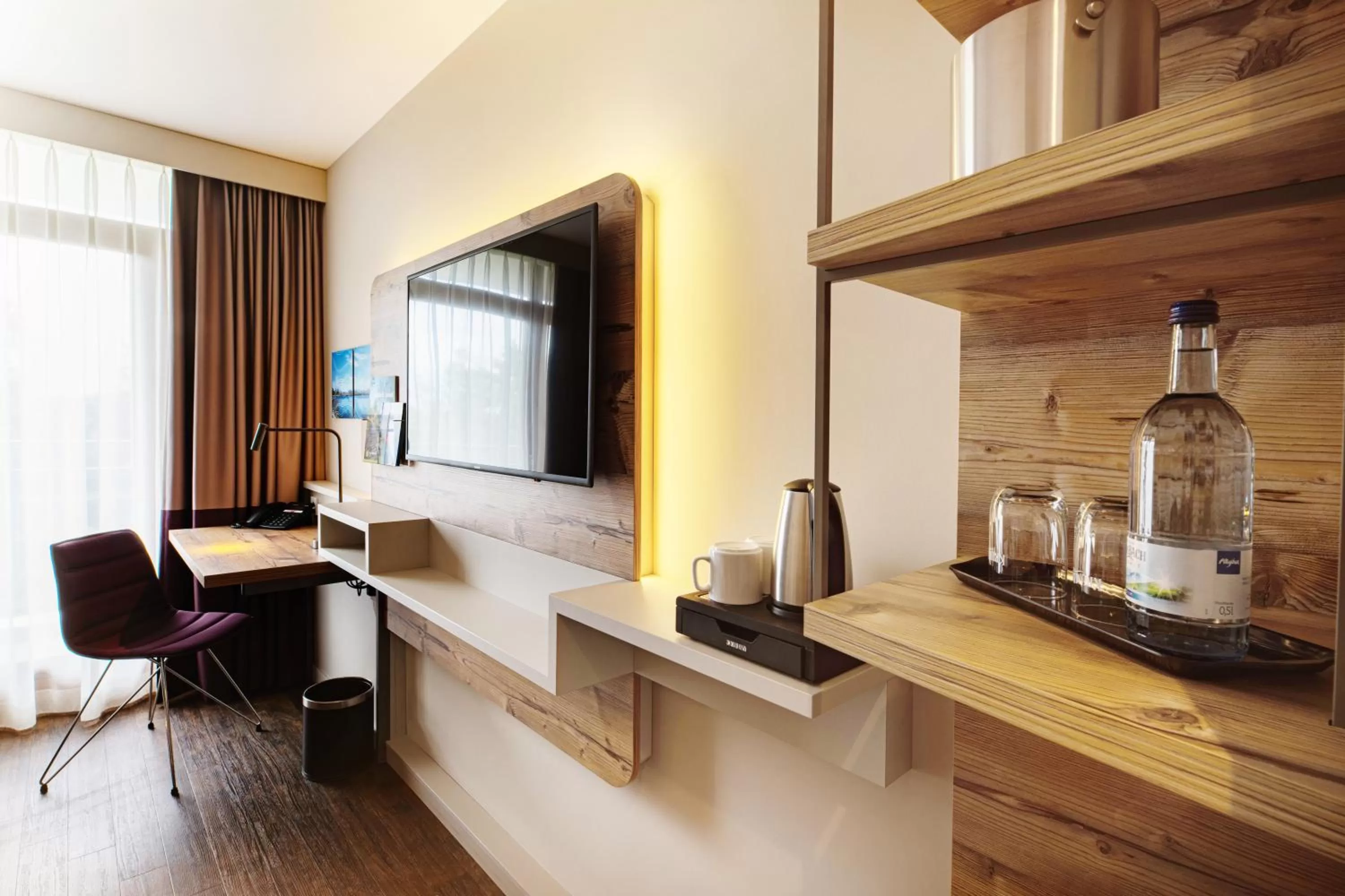 TV and multimedia, TV/Entertainment Center in feelMOOR - Gesundresort Bad Wurzach