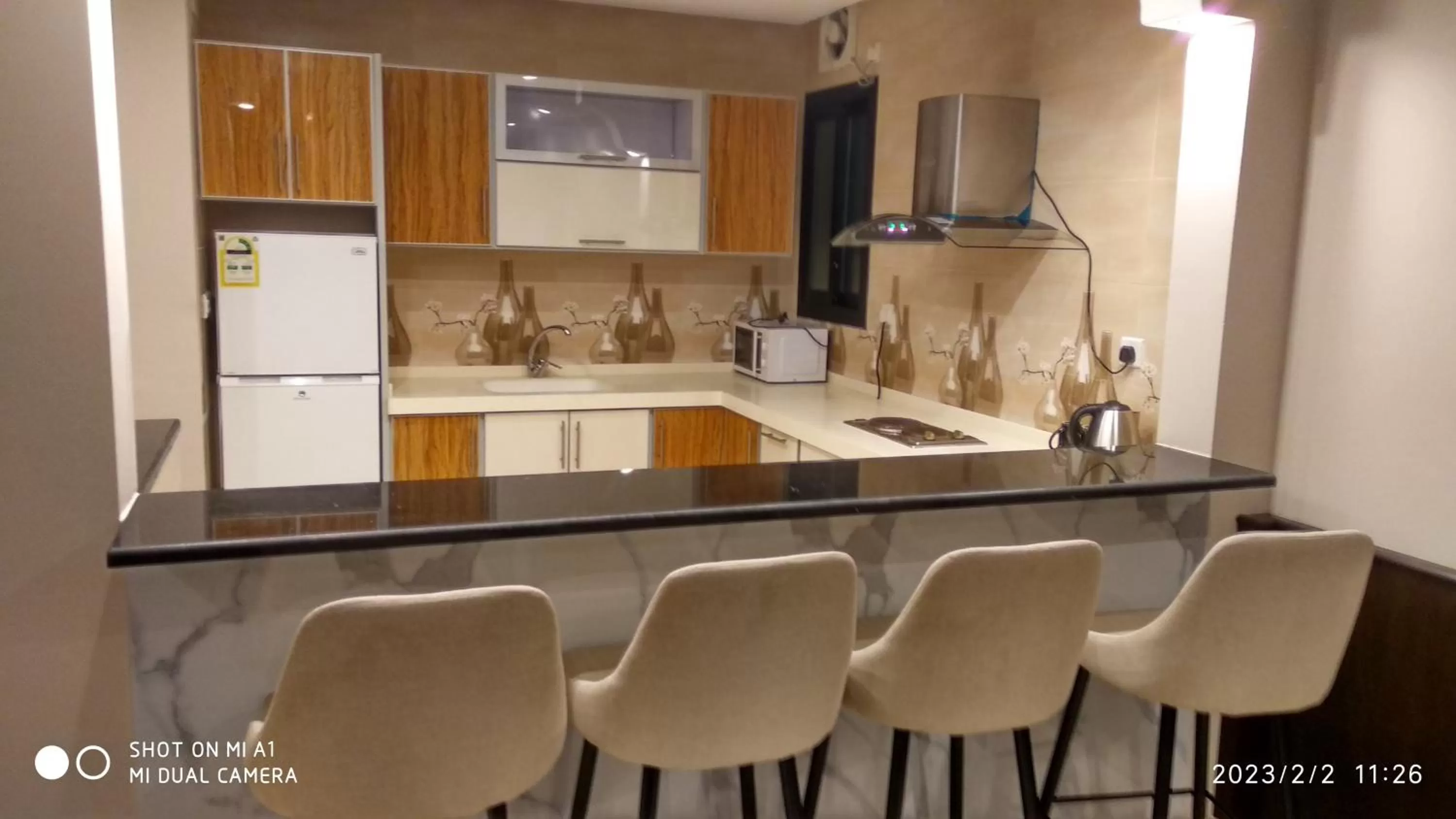 Kitchen or kitchenette in يان للشقق المخدومة - Yan Apartments