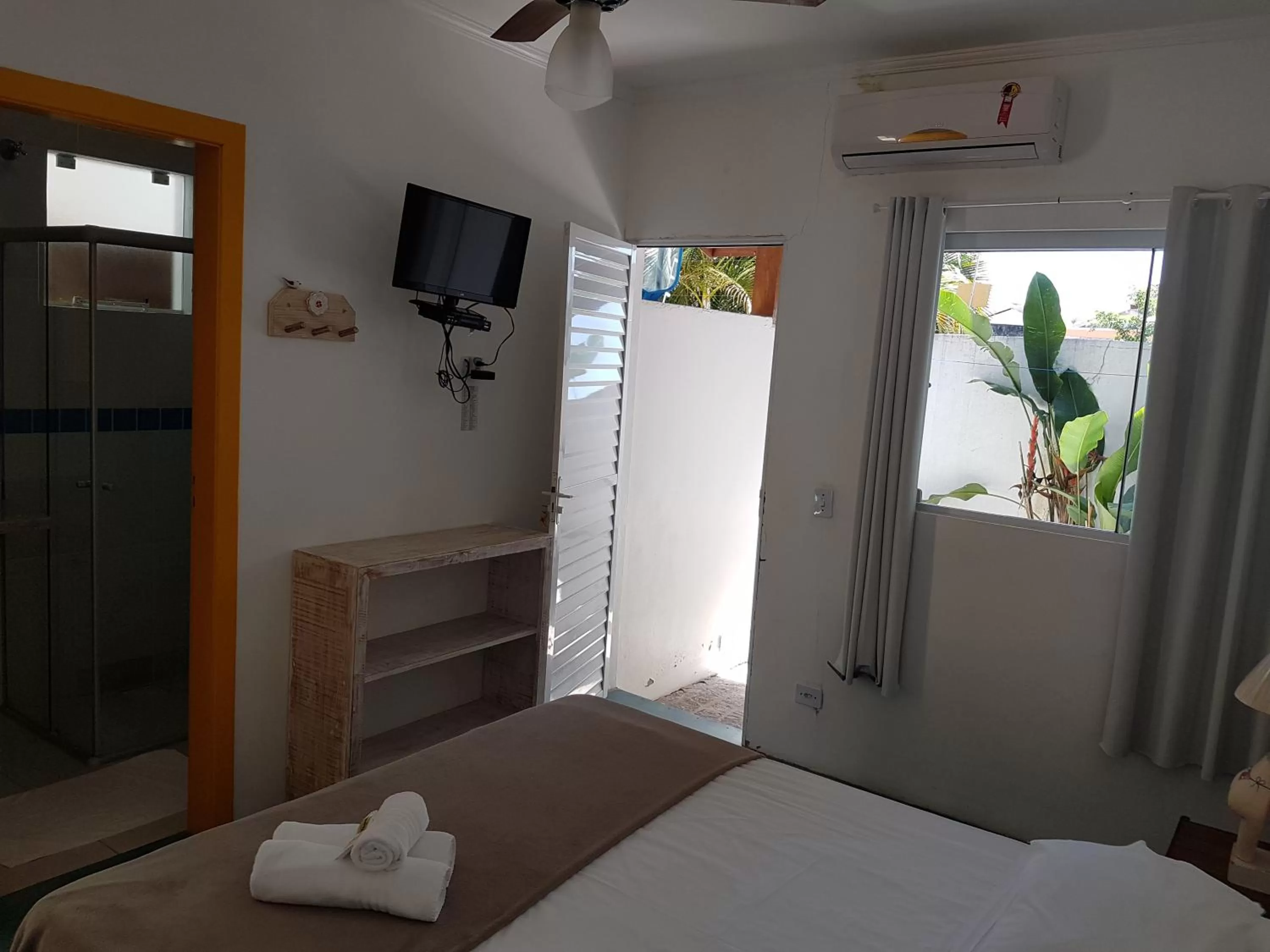 Bedroom, Bed in Hotel e Pousada Pouso54