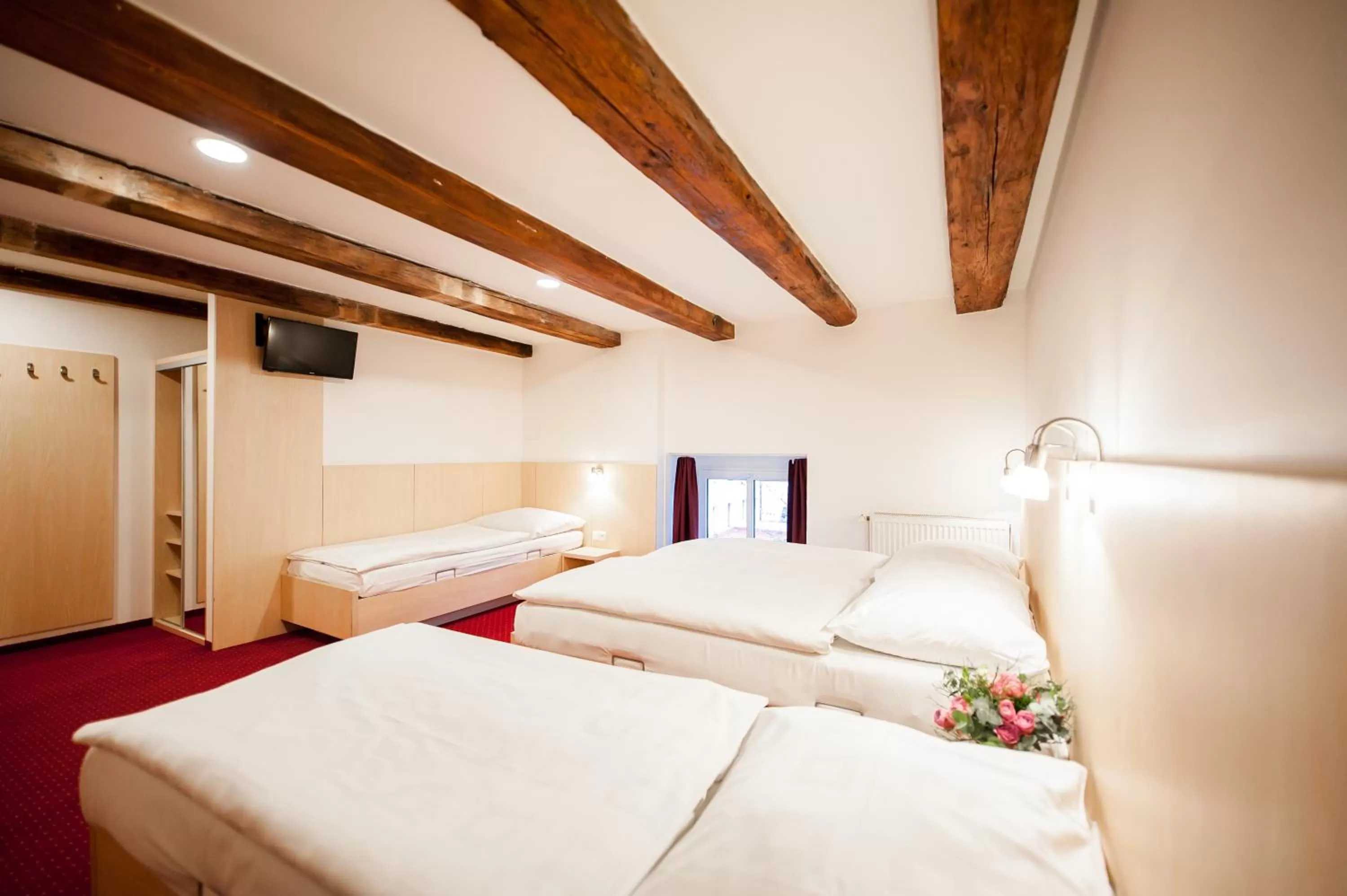 Bed in Hotel Pivovar