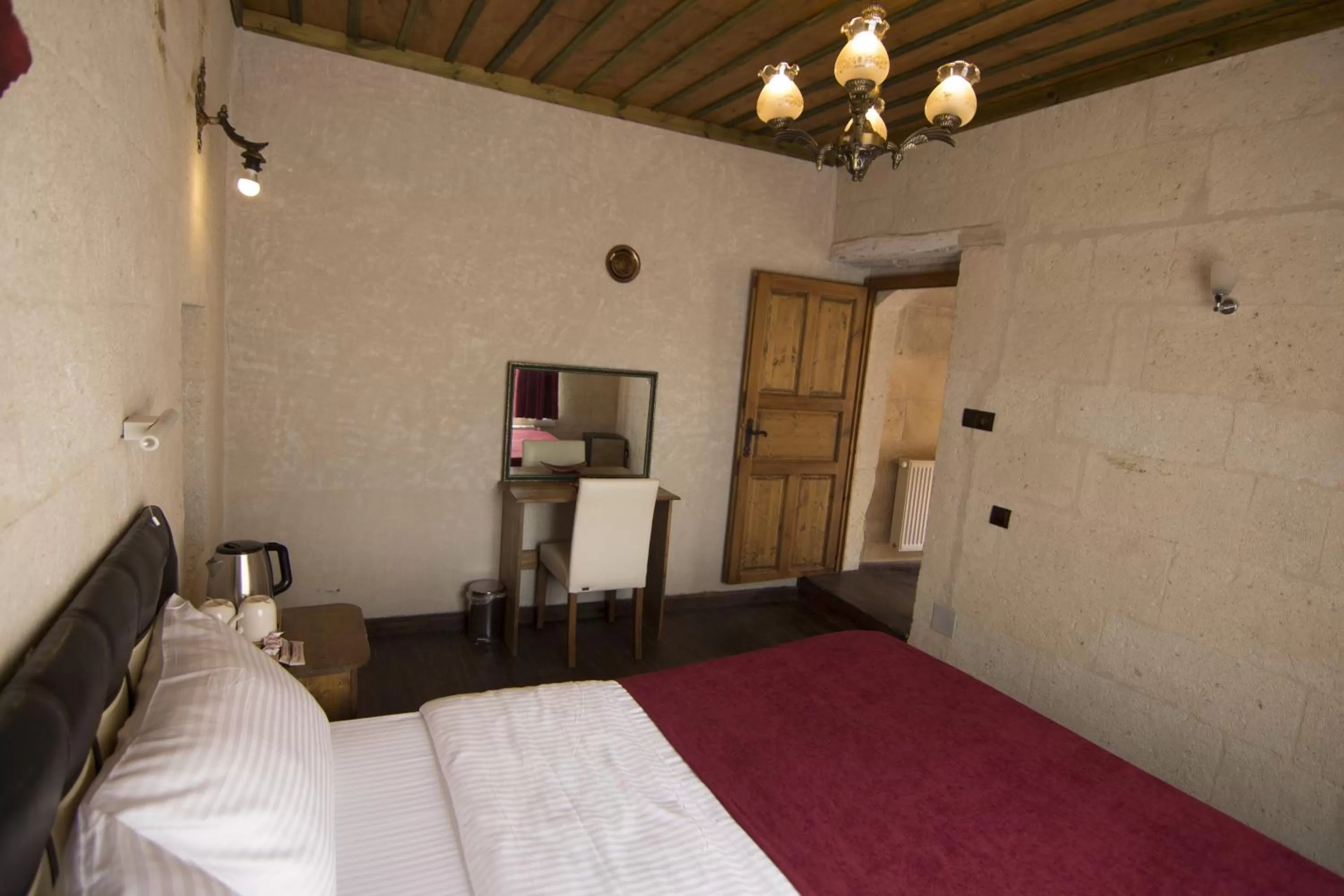 Bed in 7 Oda Kapadokya Cave Hotel