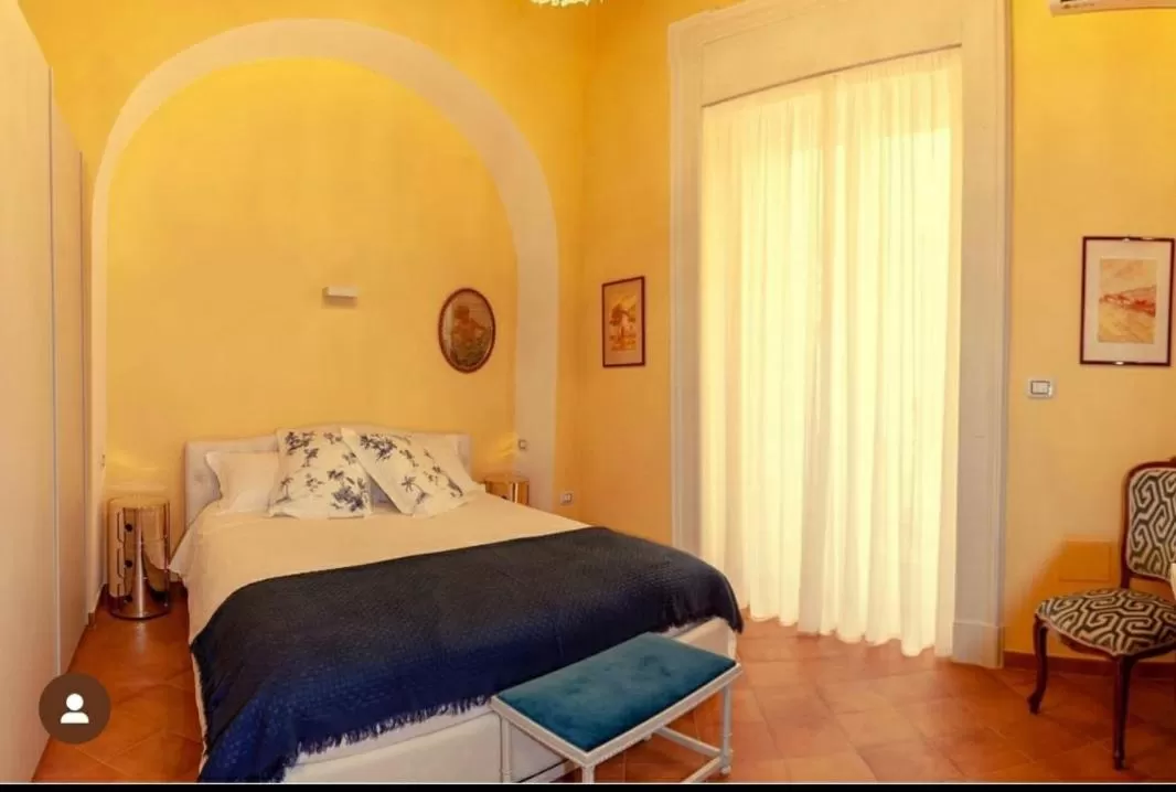 Bed in Dimora Del Campo Charming House