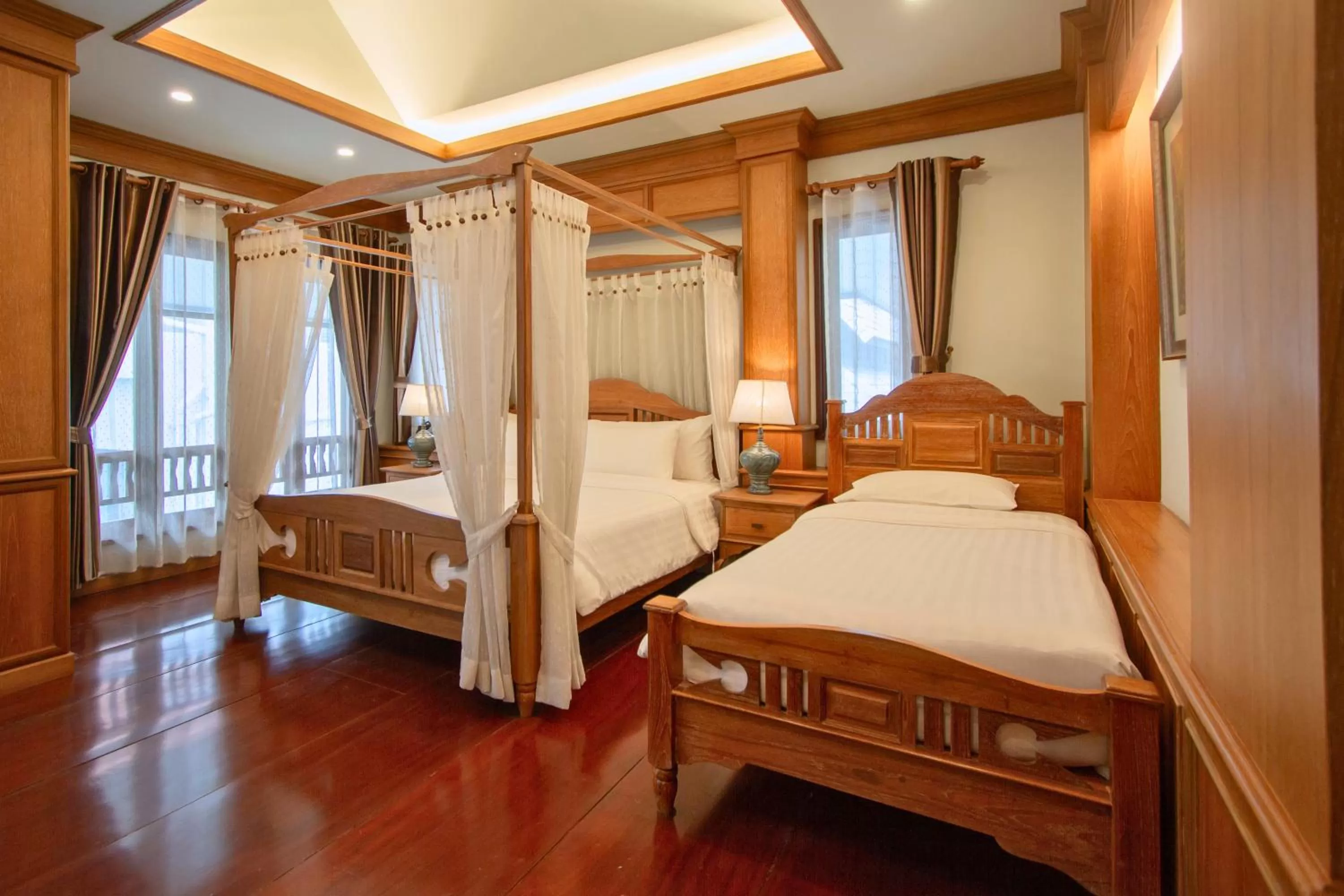 Bed in Rich Garden House Hotel