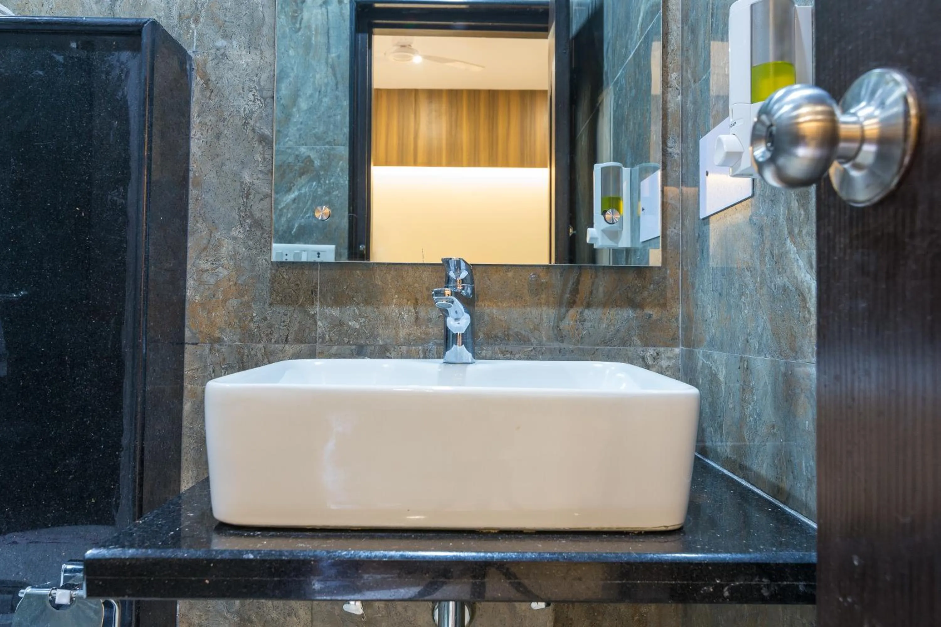 Bathroom in Rupam Hotel