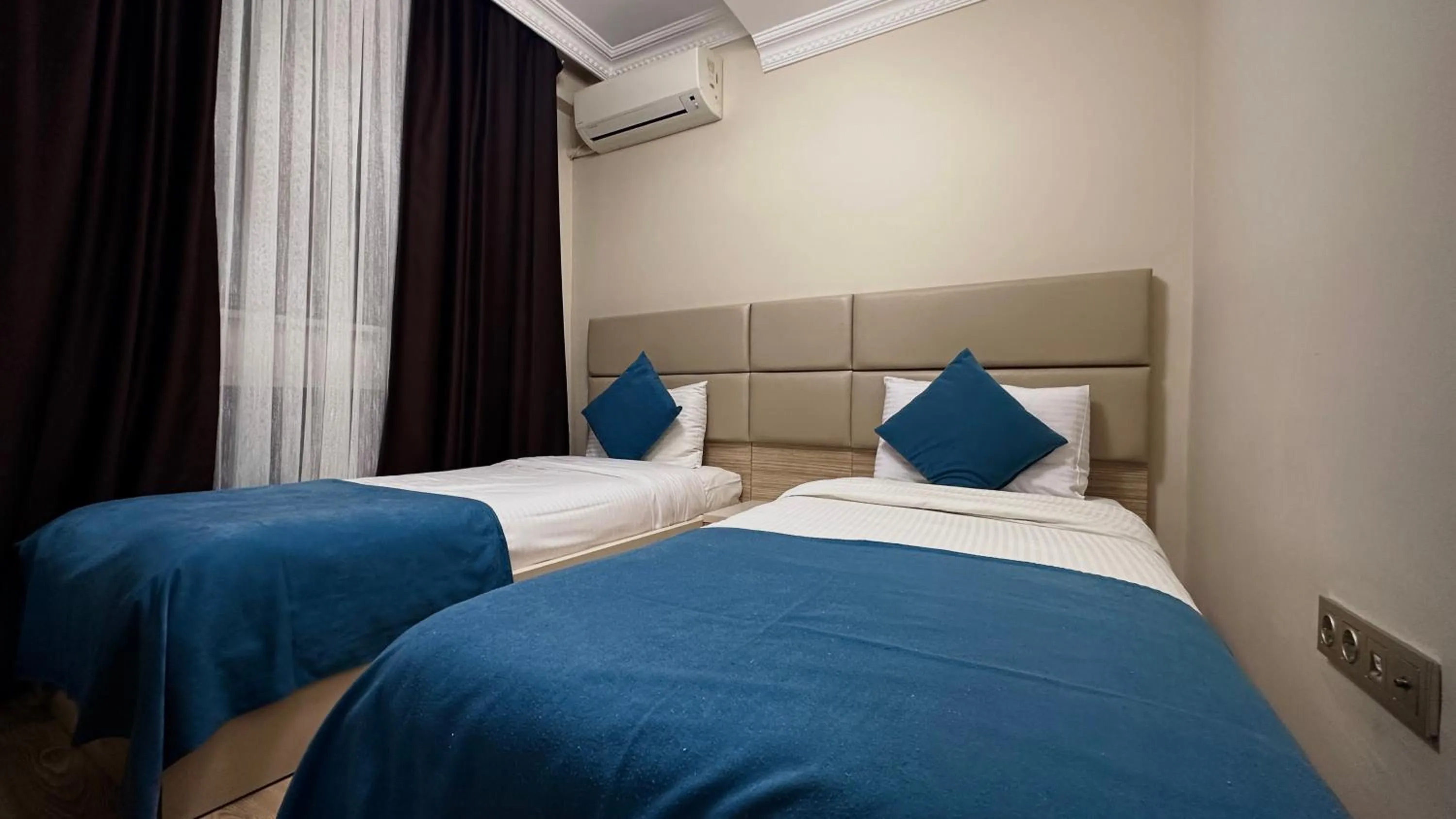 Bed in Overland Residence