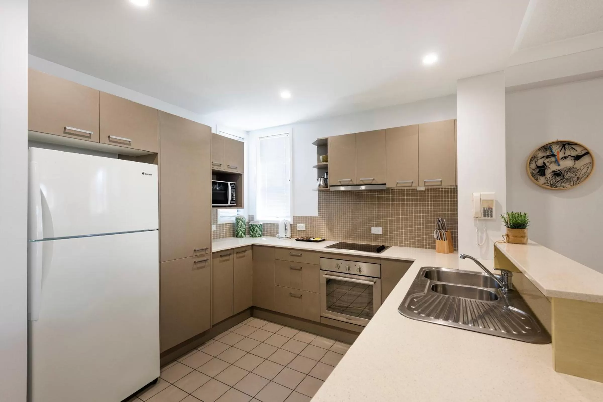 Kitchen or kitchenette in Pacific Marina Apartments