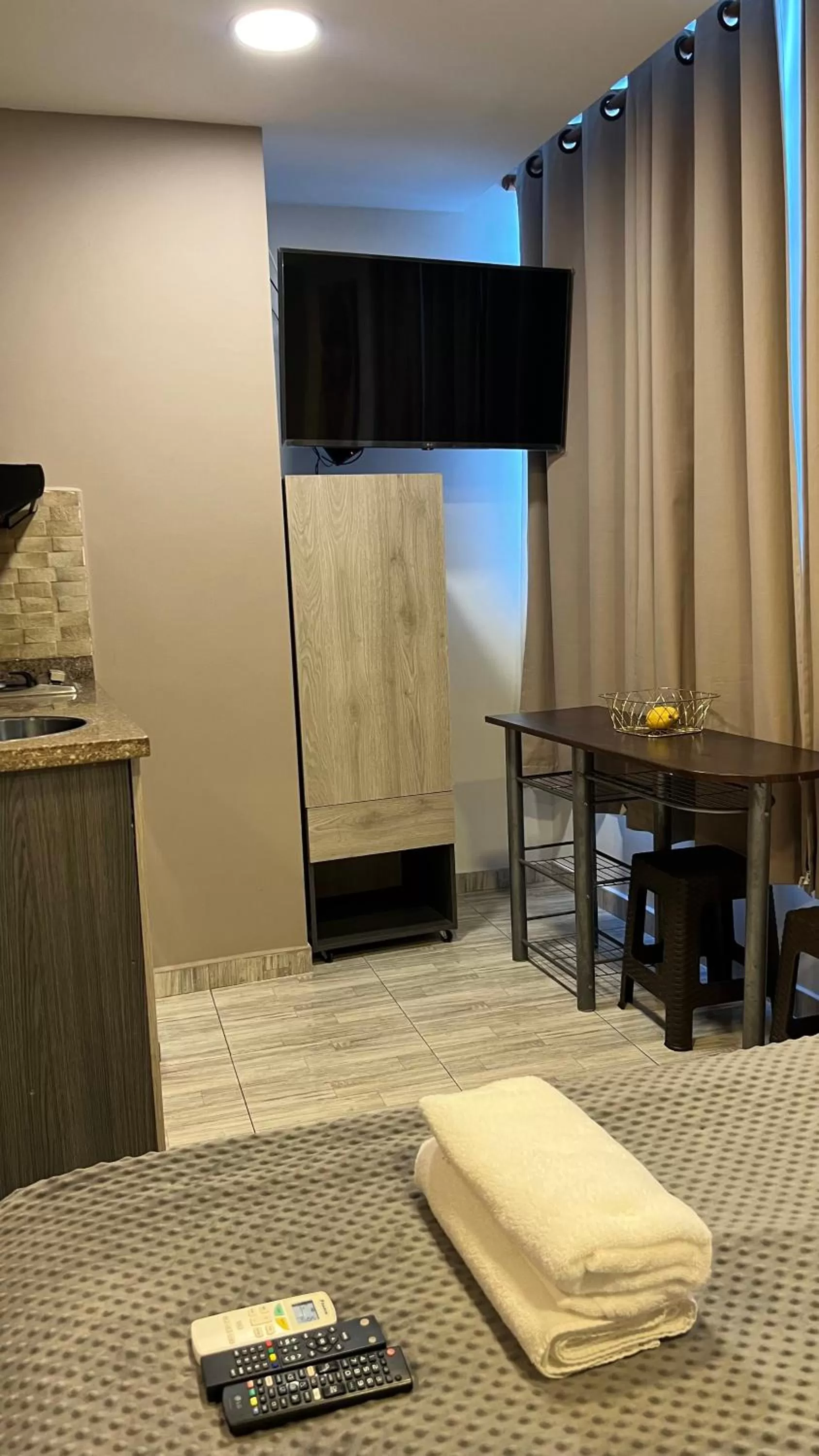 TV/Entertainment Center in Bahia 79 Apartasuites Cerca al Centro