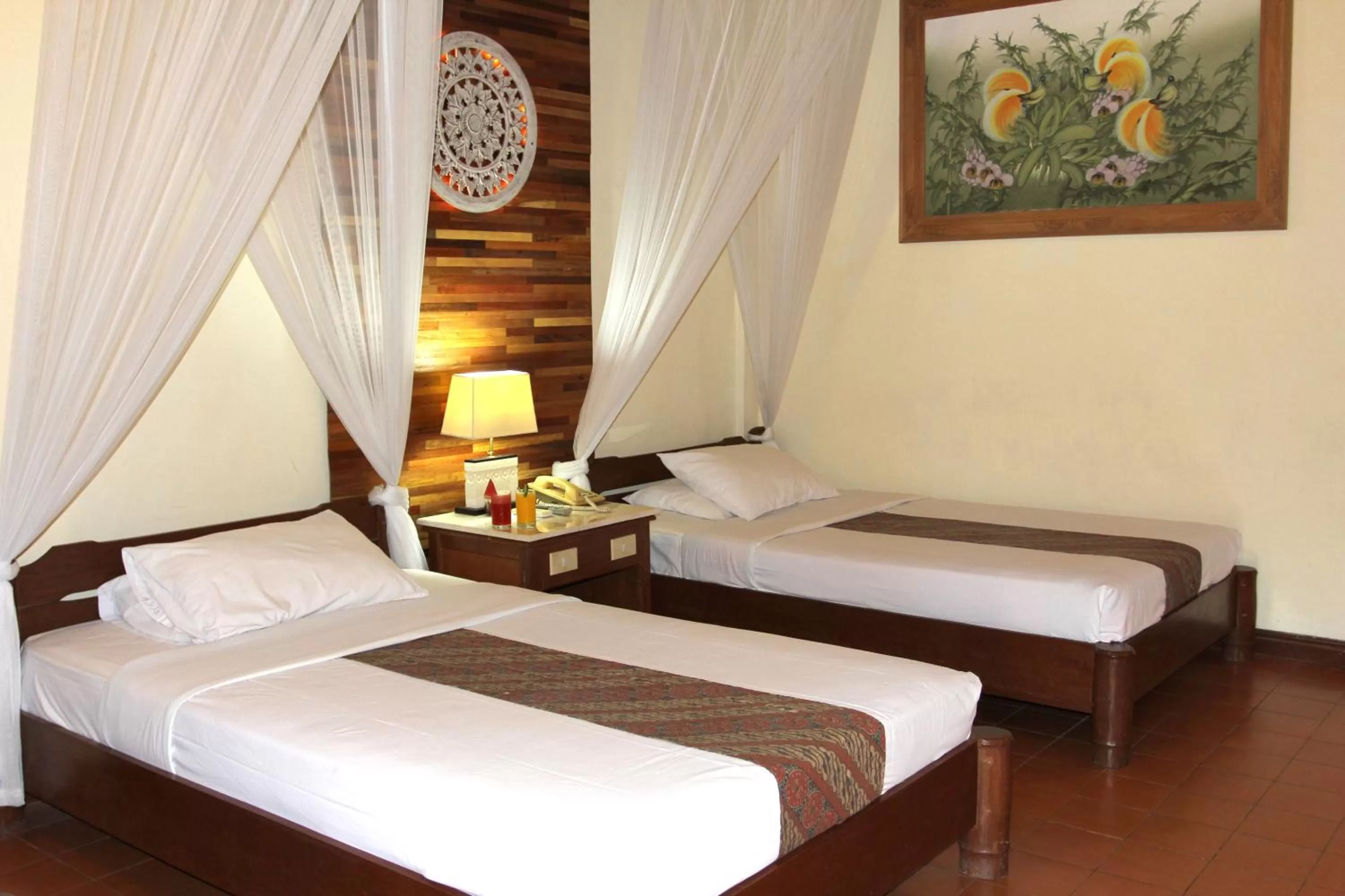 Bed in Bumi Ayu Bungalow Sanur