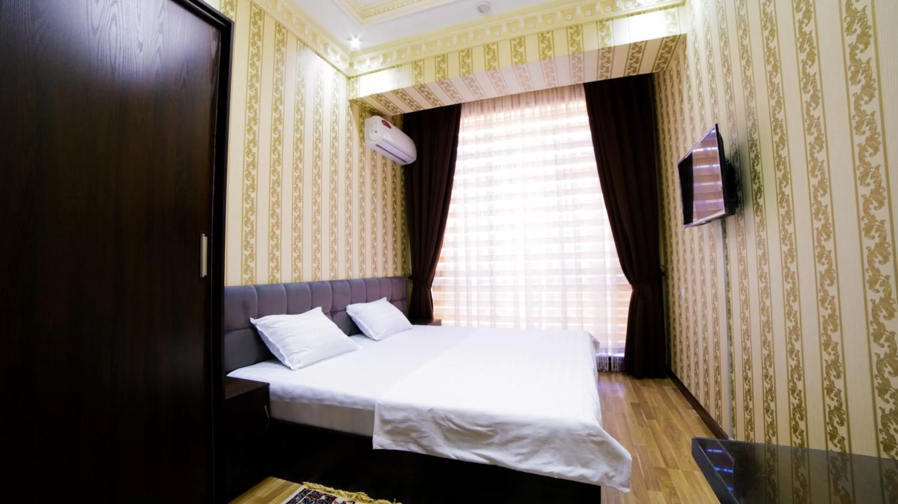 Bed in Alliance Hotel Tashkent