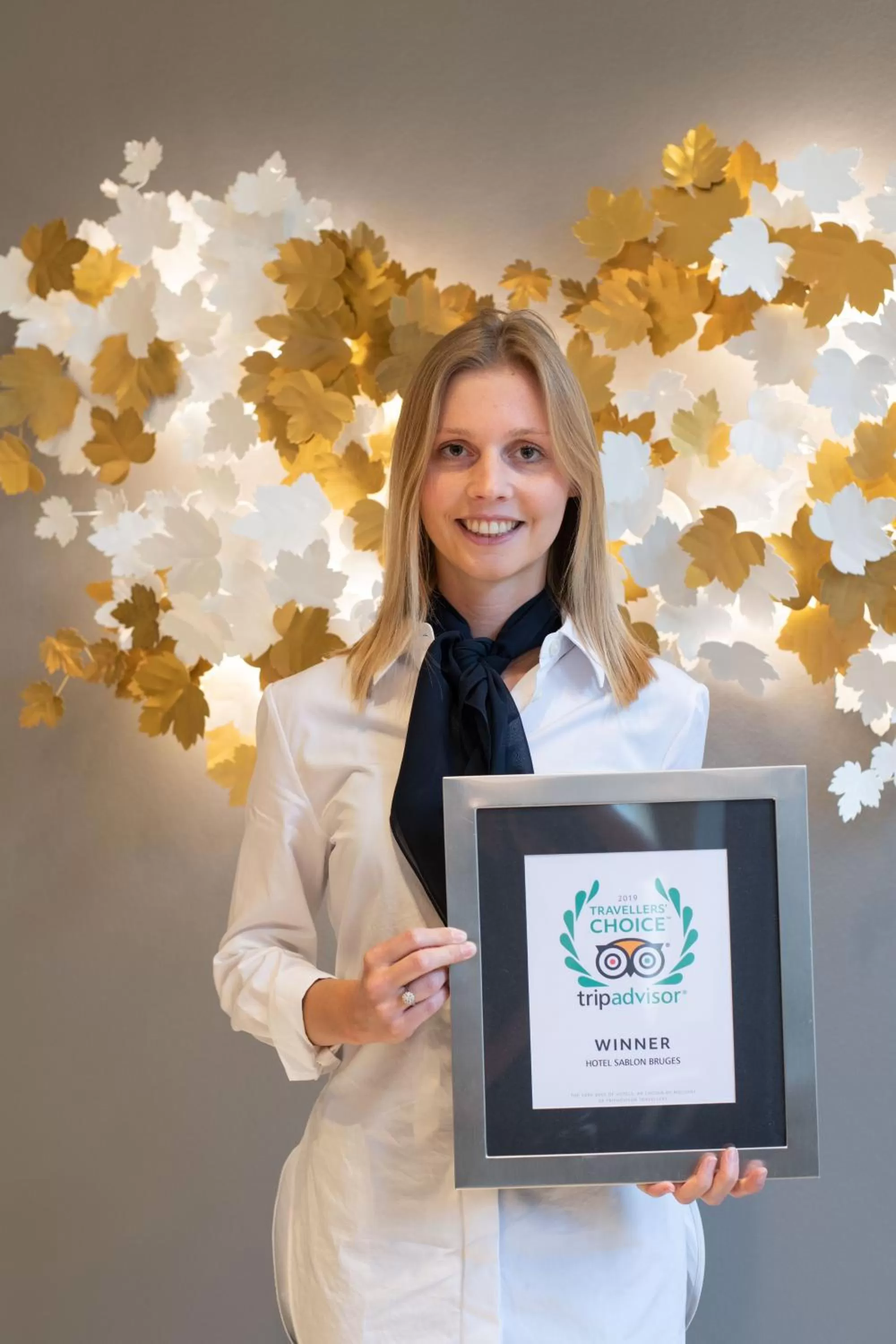 Property logo or sign in Boutique Hotel Sablon by CW Hotel Collection