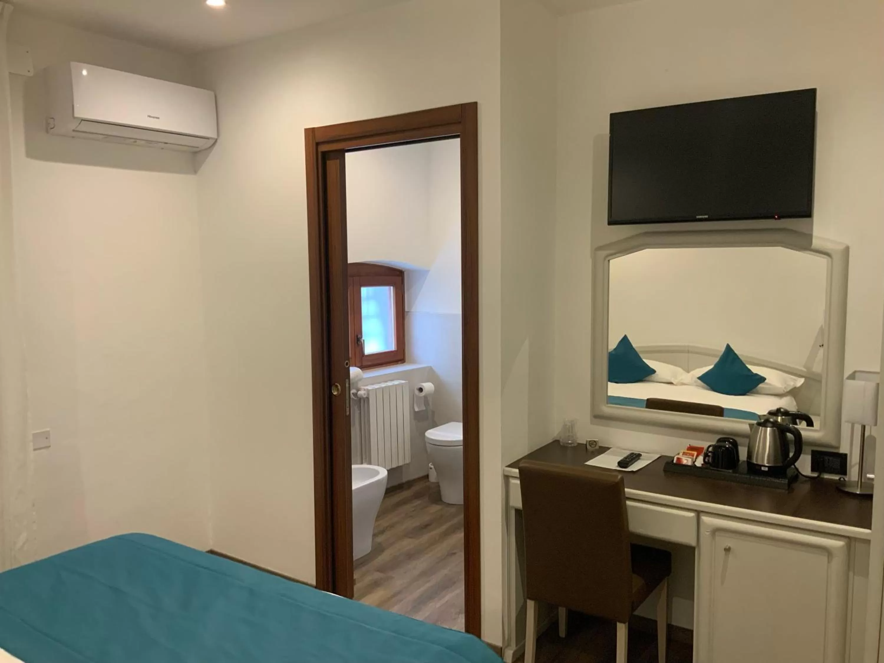 Bed in Albergo Cappello e Cadore