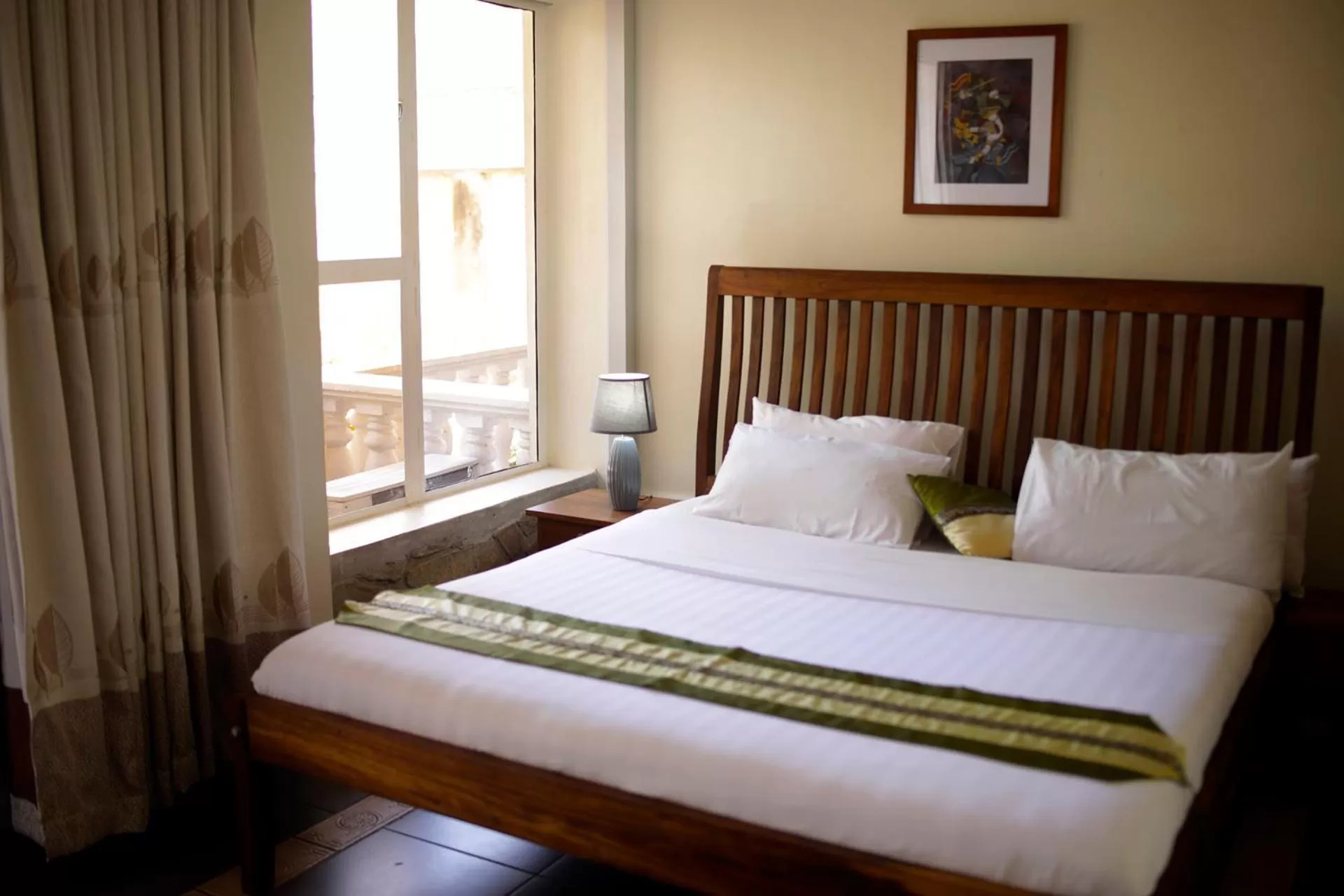 Bed in Entebbe Palm Hotel