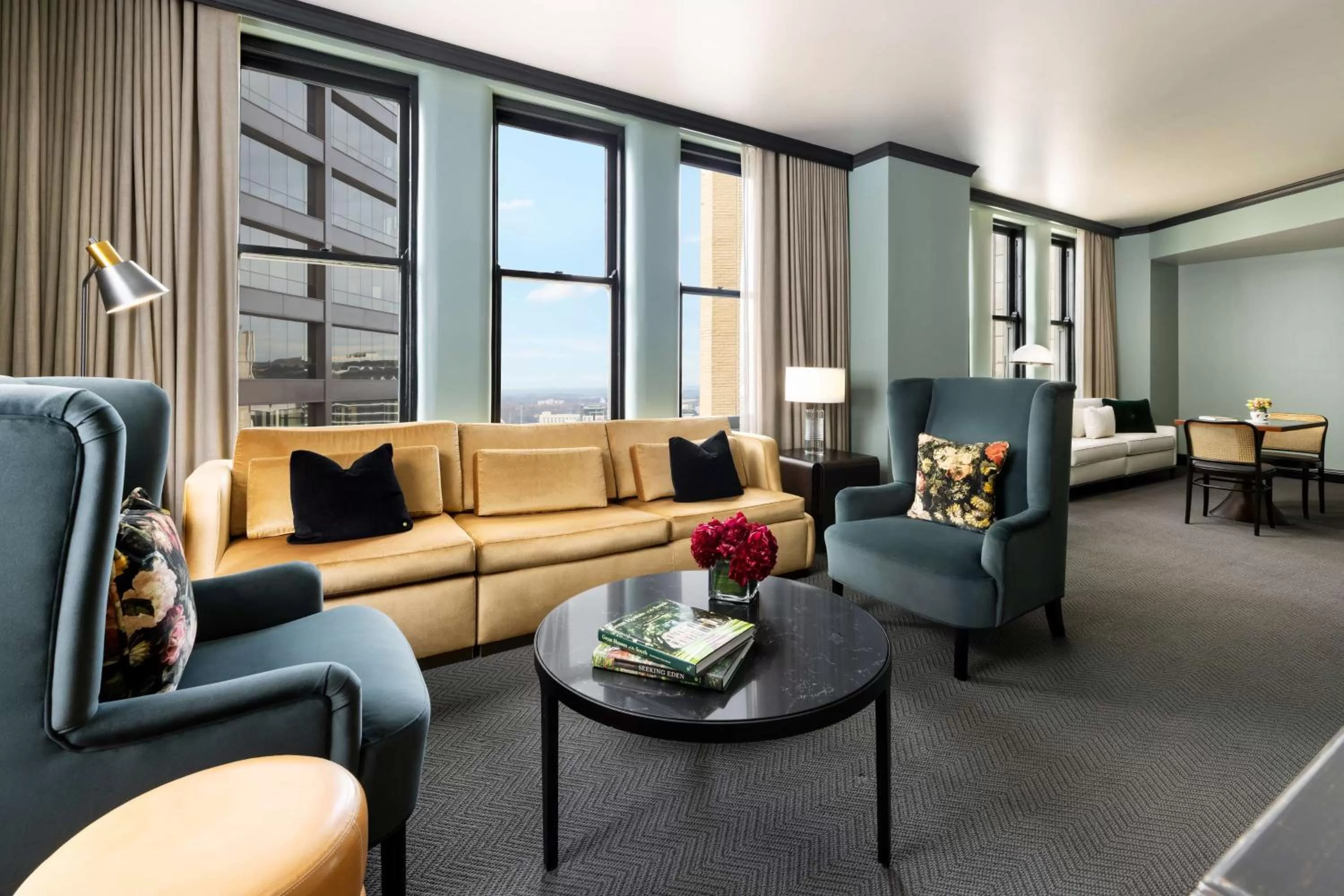 Living room in The Candler Hotel Atlanta, Curio Collection by Hilton