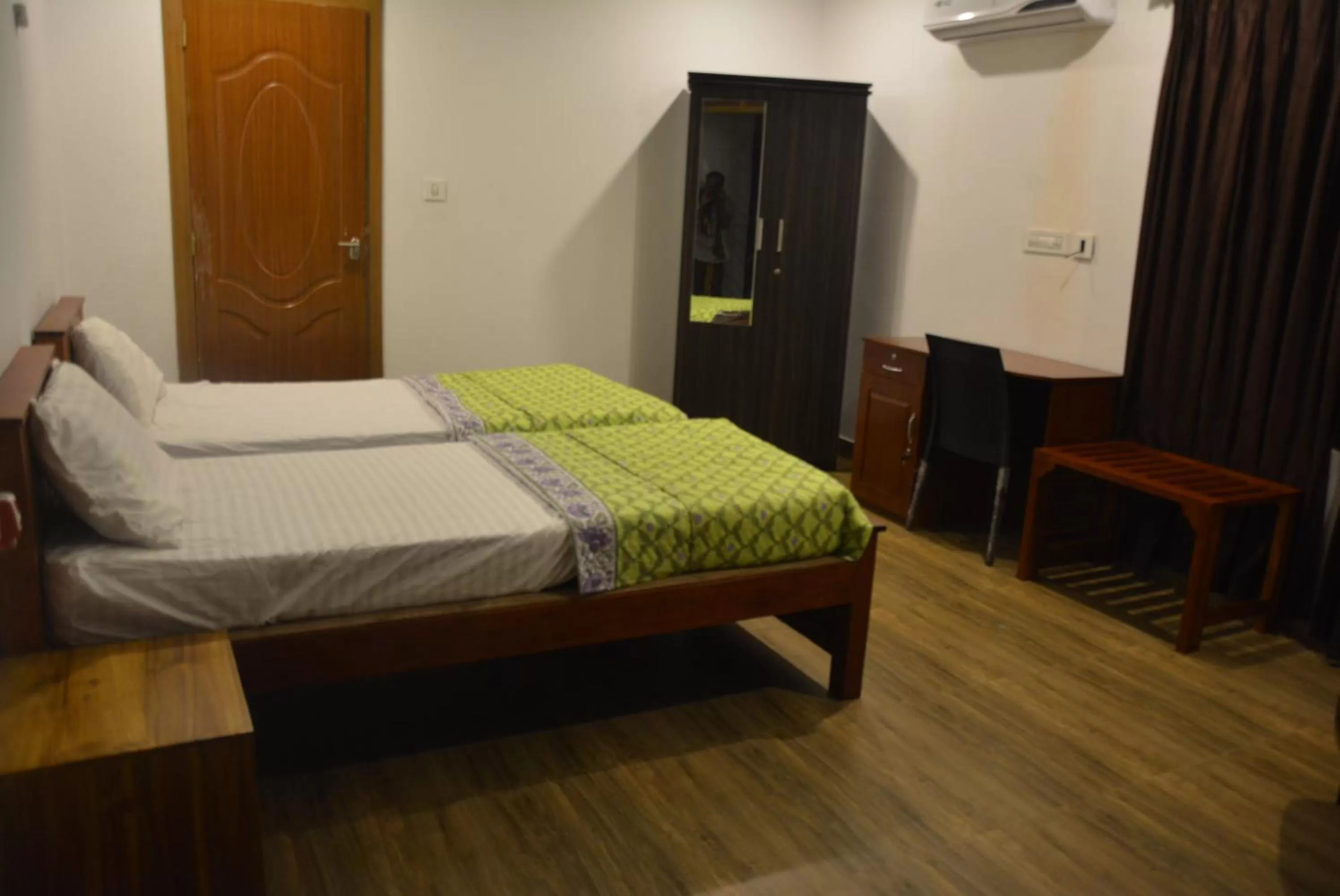 Bed in White Shell Beach House