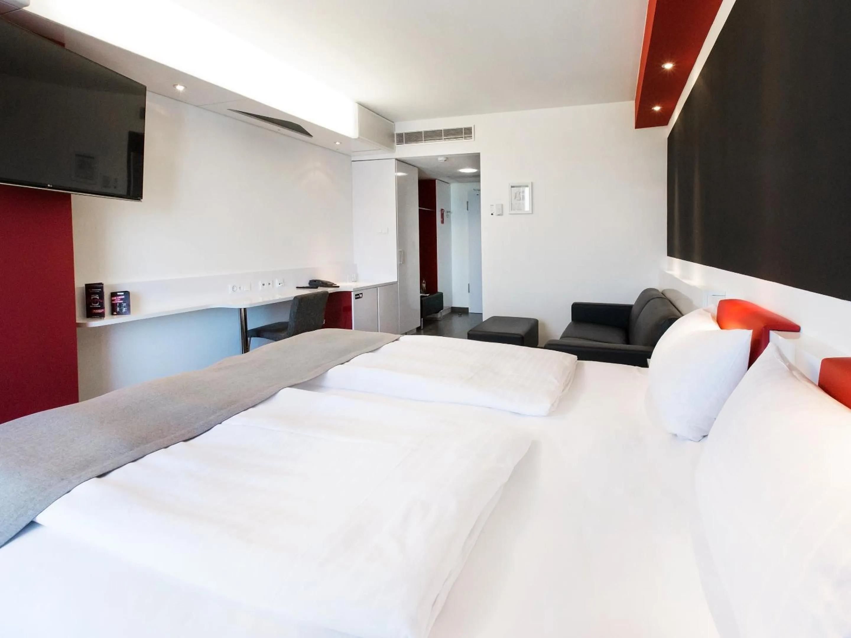 Photo of the whole room, Bed in DORMERO Hotel Stuttgart