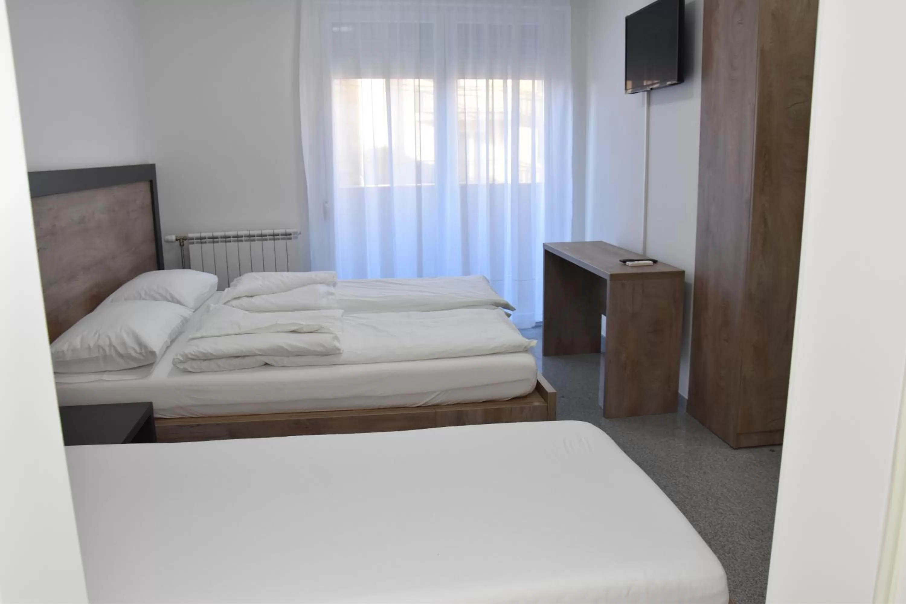 Communal lounge/ TV room, Bed in Motel Centar