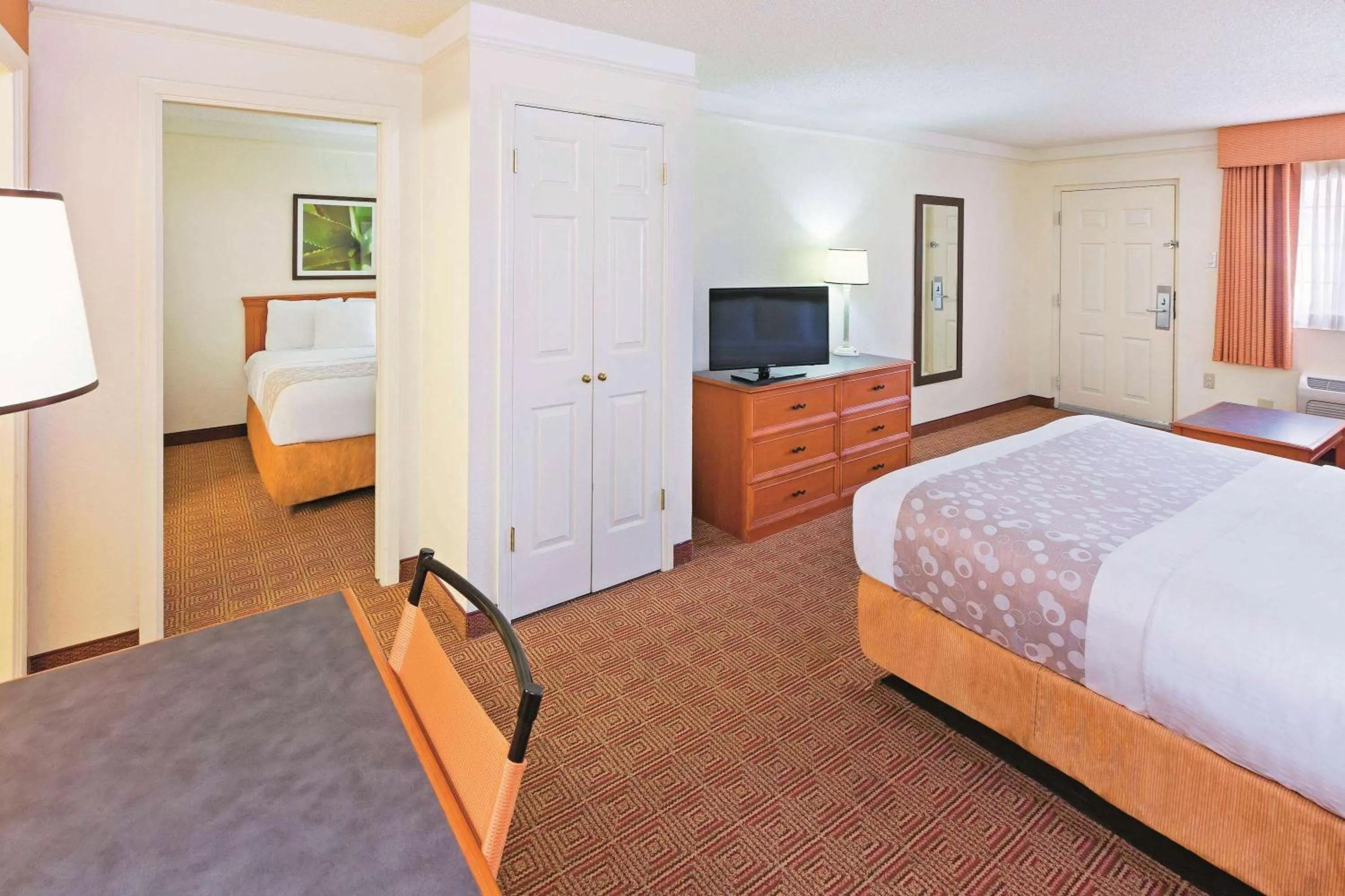 Two Bedroom Suite with One King and Two Queen Beds in Super 8 by Wyndham San Antonio Near SeaWorld Ingram Park