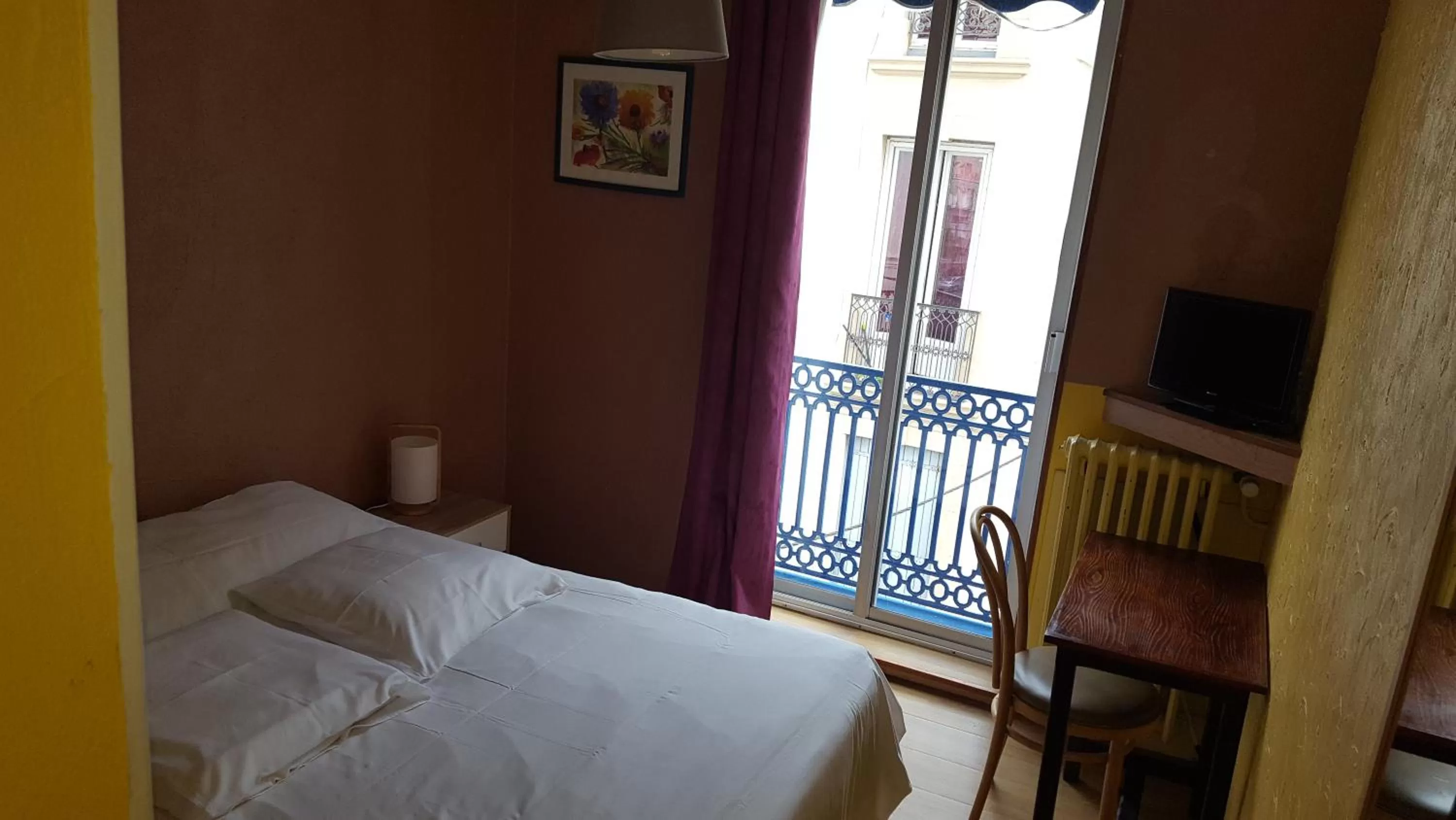 Bed in Hôtel Confort