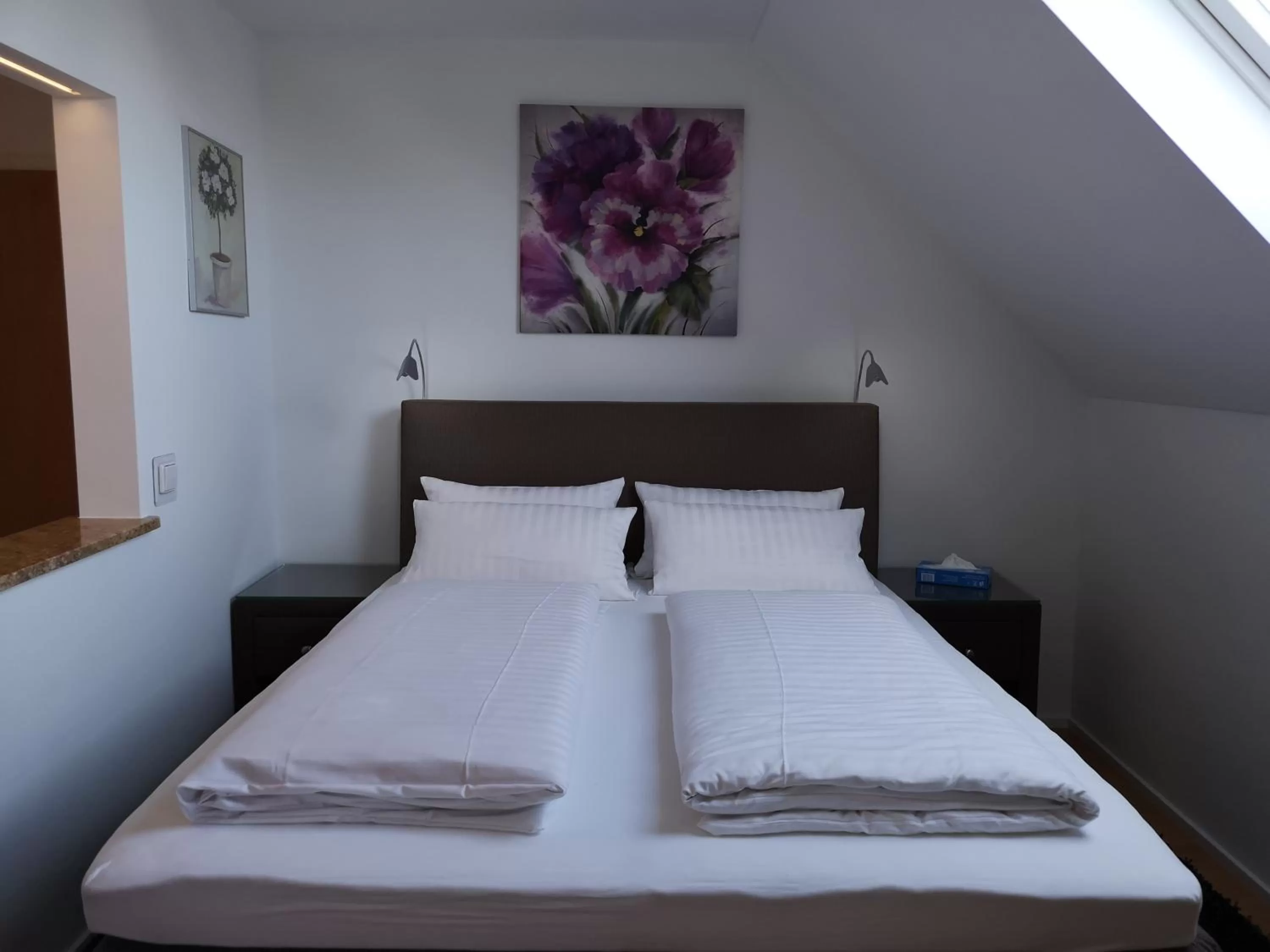 Bed in Tuniberg Restaurant Hotel