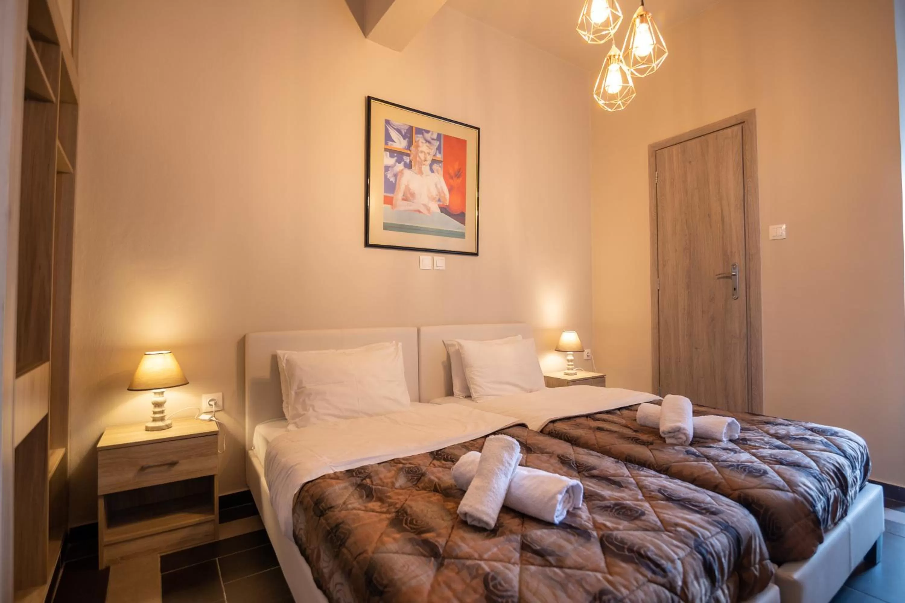 Bed in Votsalakia Hotel & Luxury Apartments