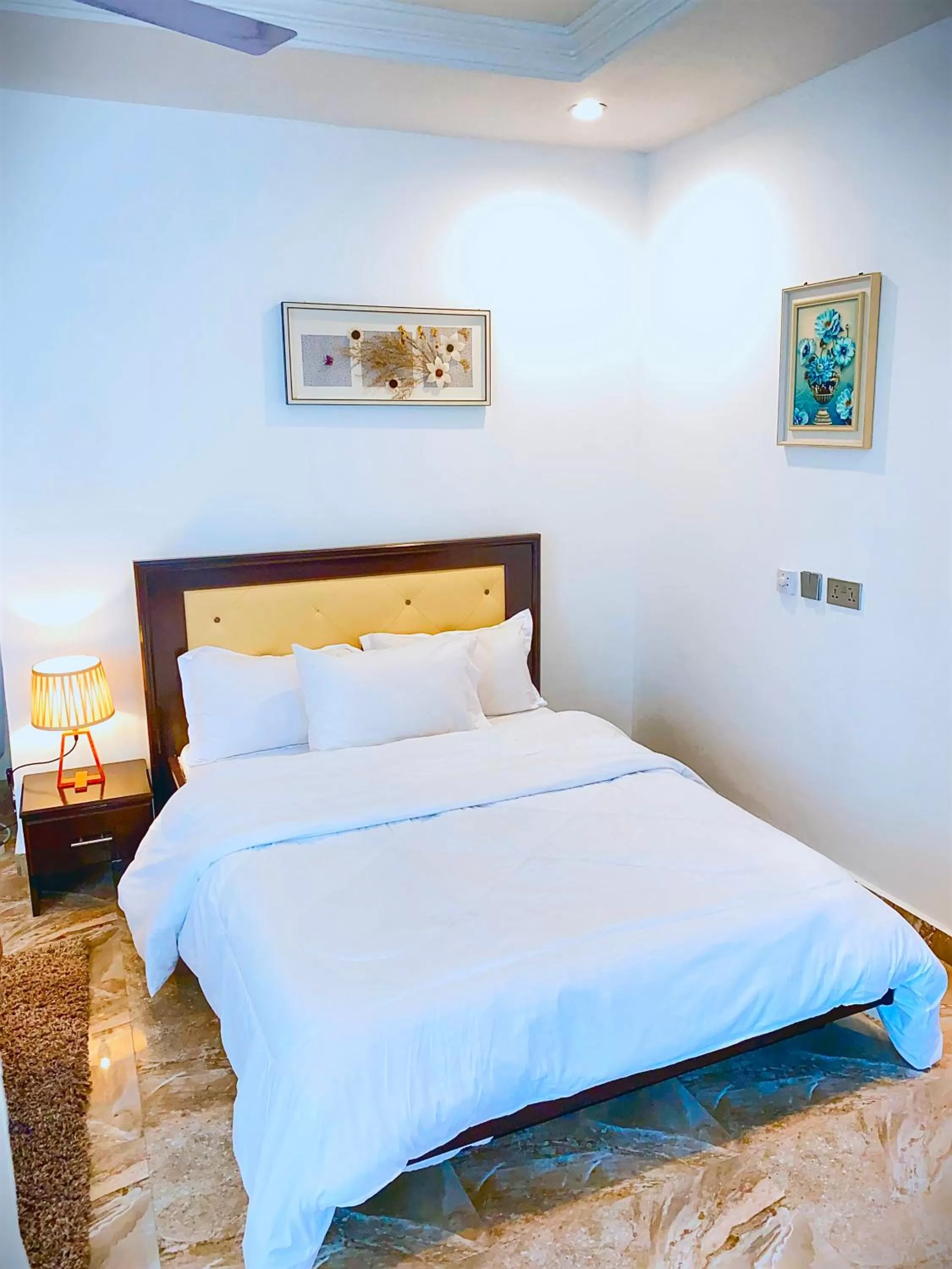 Bed in AIDEN HOMES AND APARTMENTS