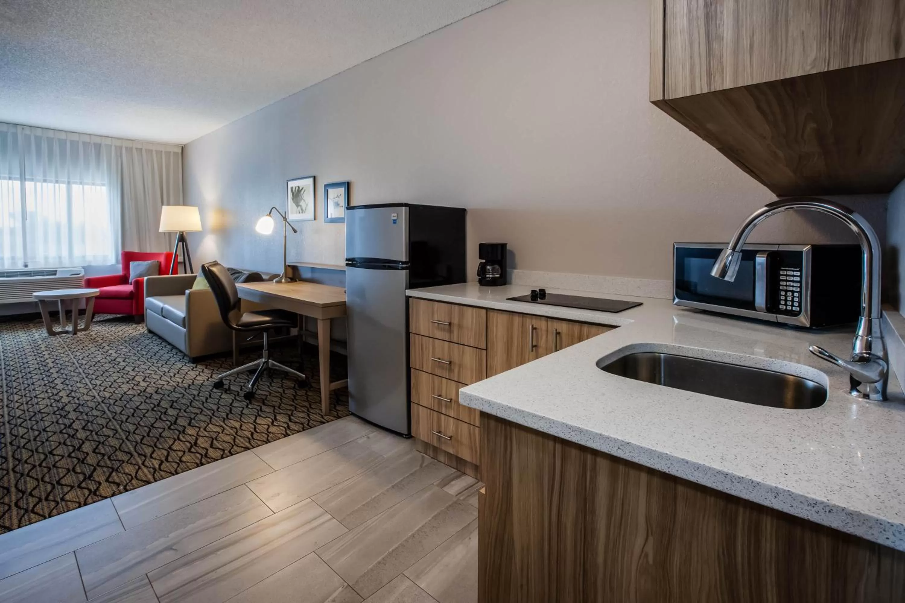 Kitchen or kitchenette in Days Inn & Suites by Wyndham Rochester Hills MI