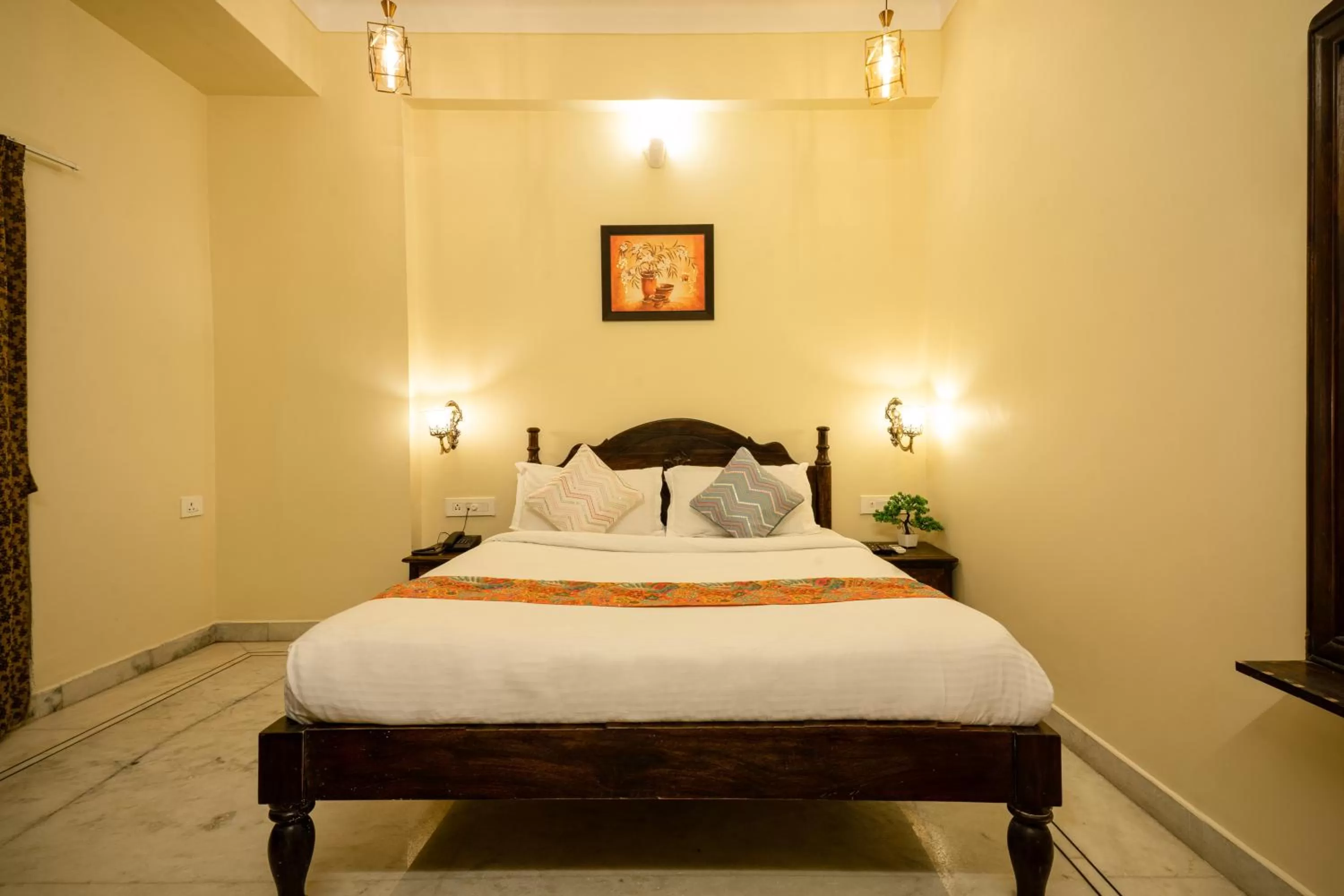 Bed in Tripli Hotels Shiv Villas