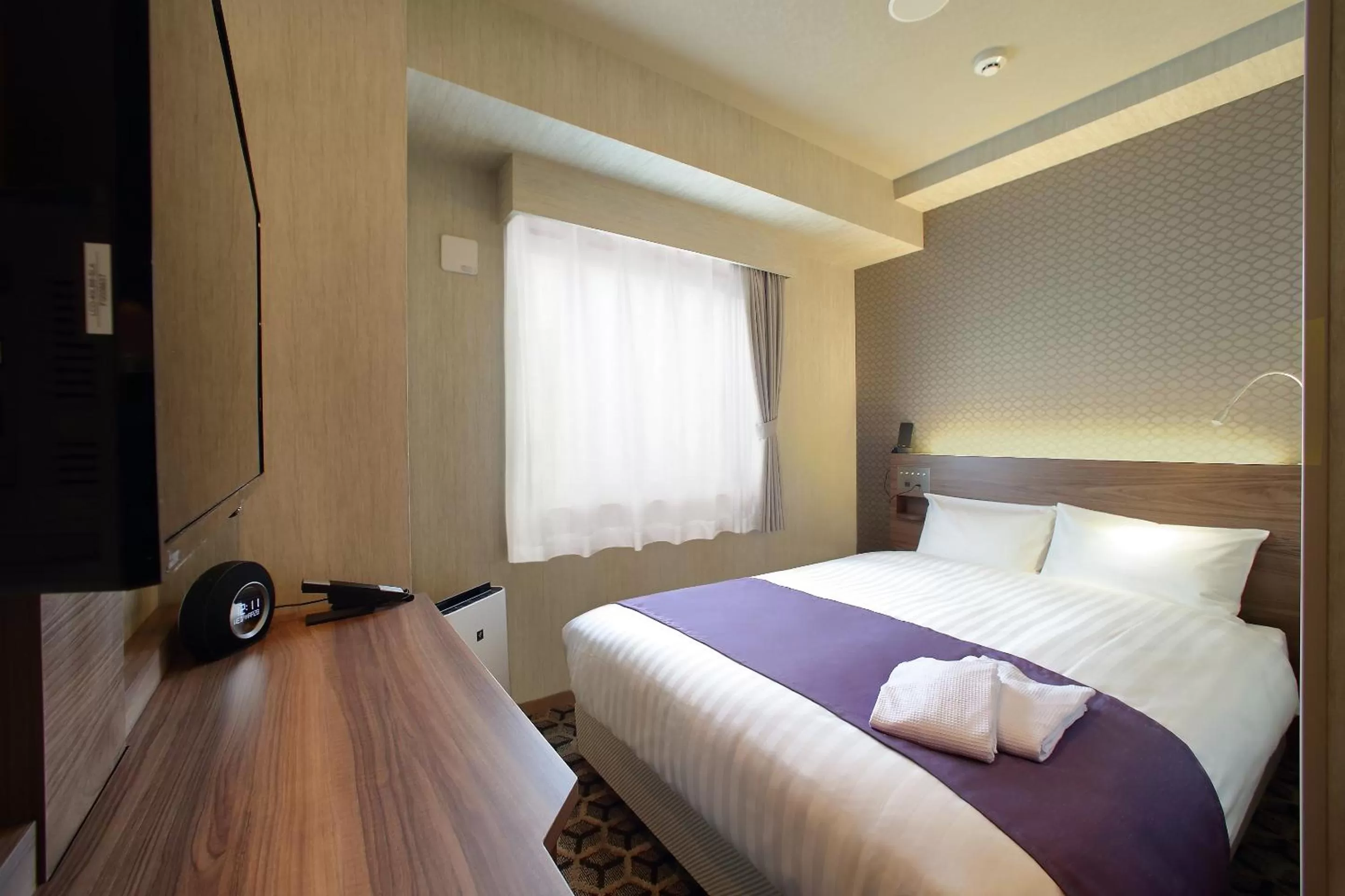 Bed in Hotel Oriental Express Osaka Shinsaibashi