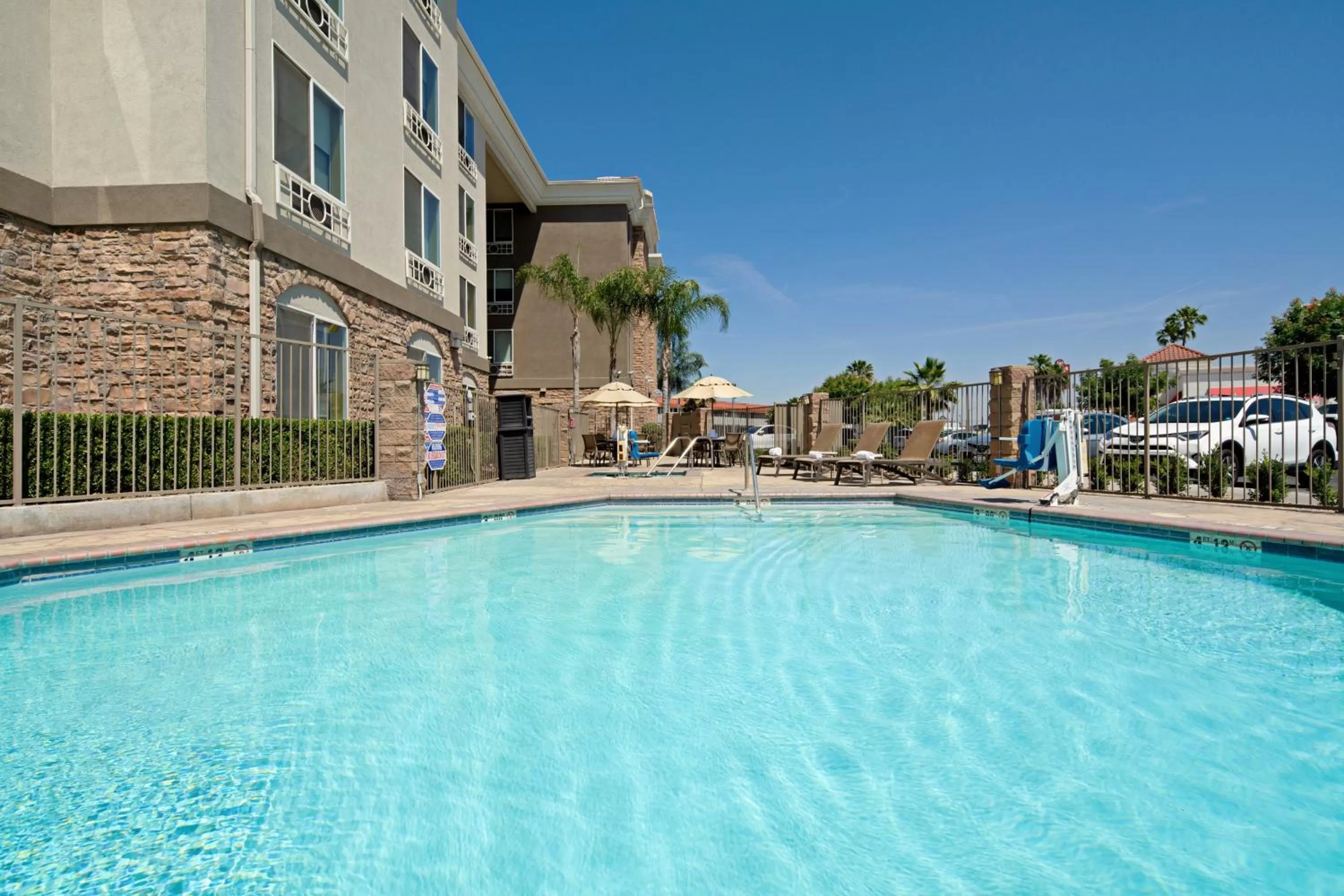 Swimming pool in Holiday Inn Express Fresno South by IHG