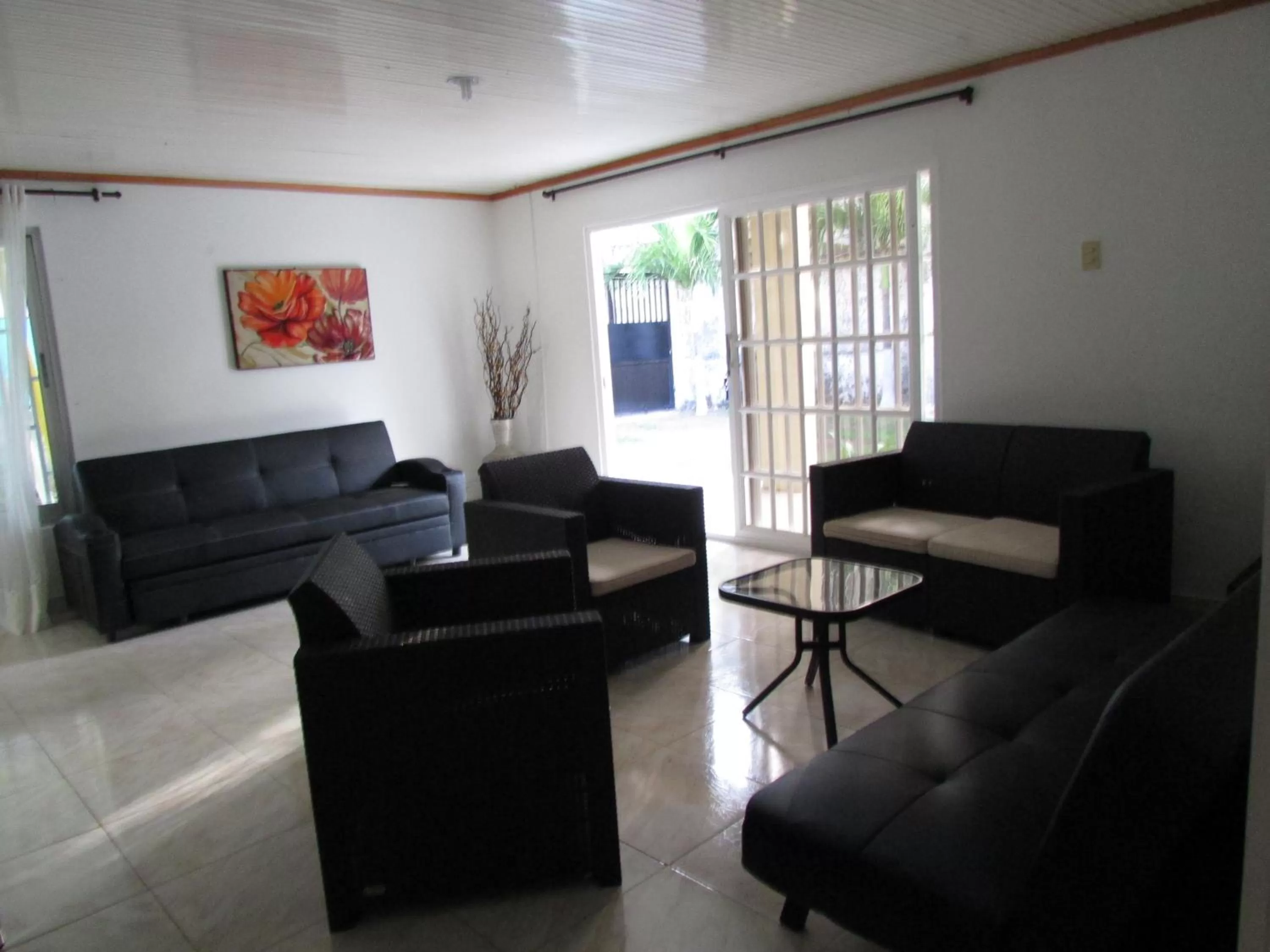 Communal lounge/ TV room, Seating Area in Posada Hostal Miss Marlly