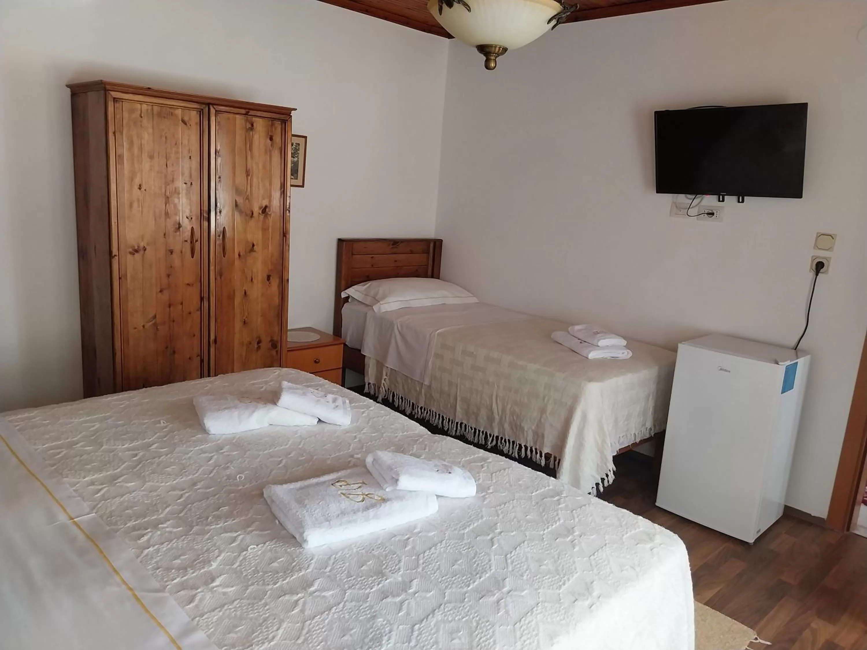 Bed in Guest House J.Prifti