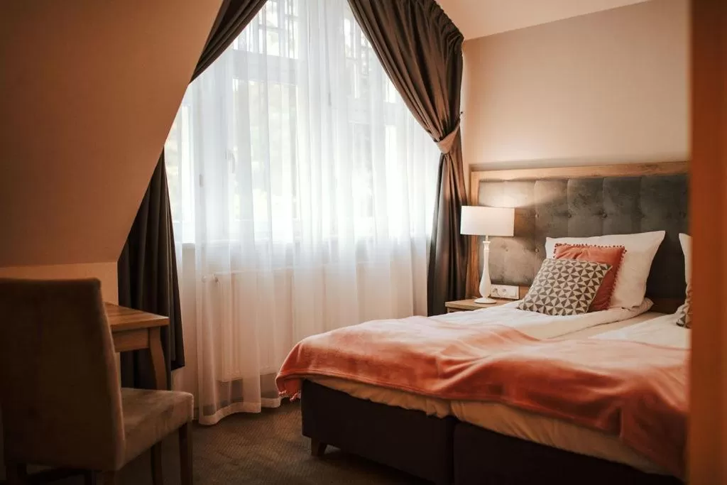 Bed in Hotel Dębowy Biowellness & SPA Góry Sowie