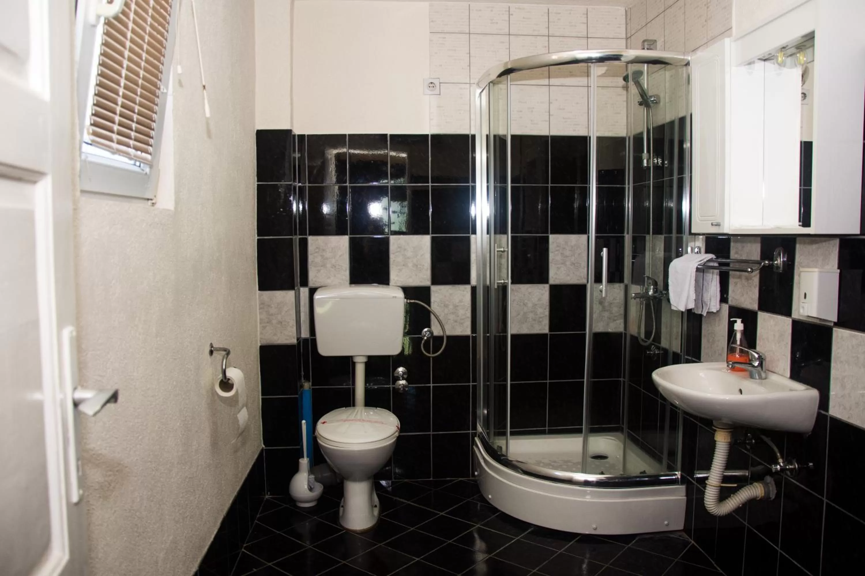 Bathroom in Motel Aura