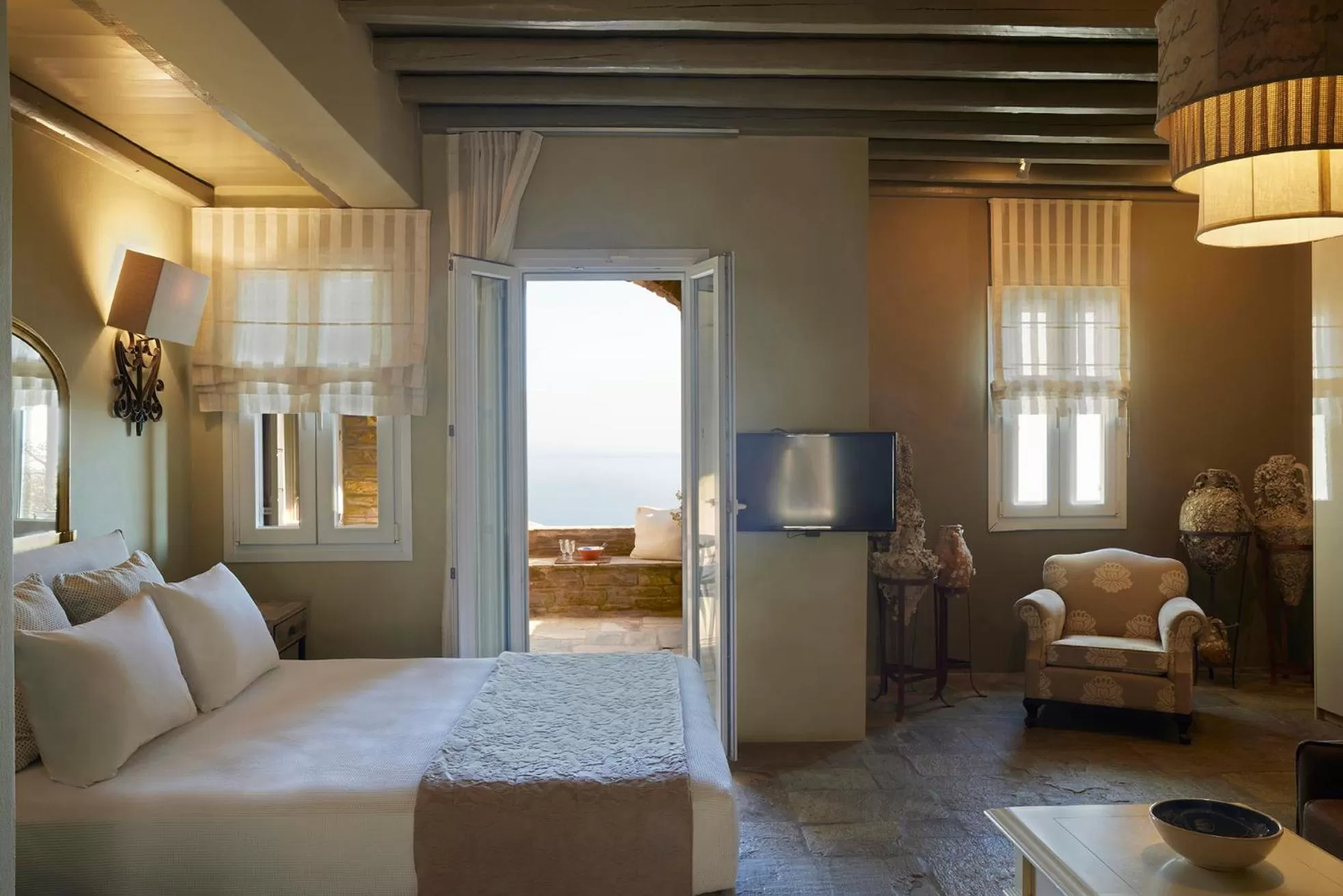 Photo of the whole room, Bed in Aeolis Tinos Suites