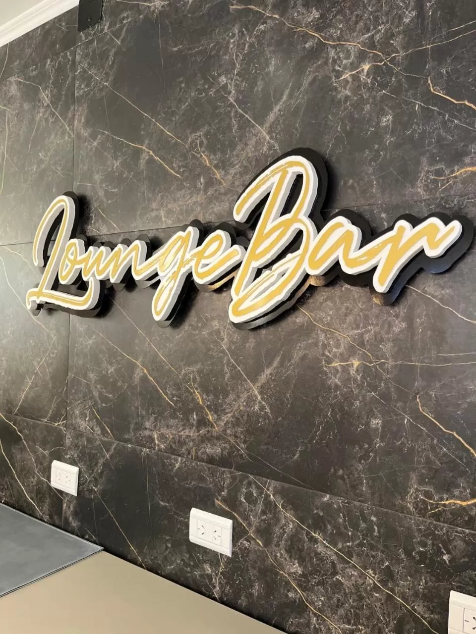 Property logo or sign in Ayres Apart Hotel