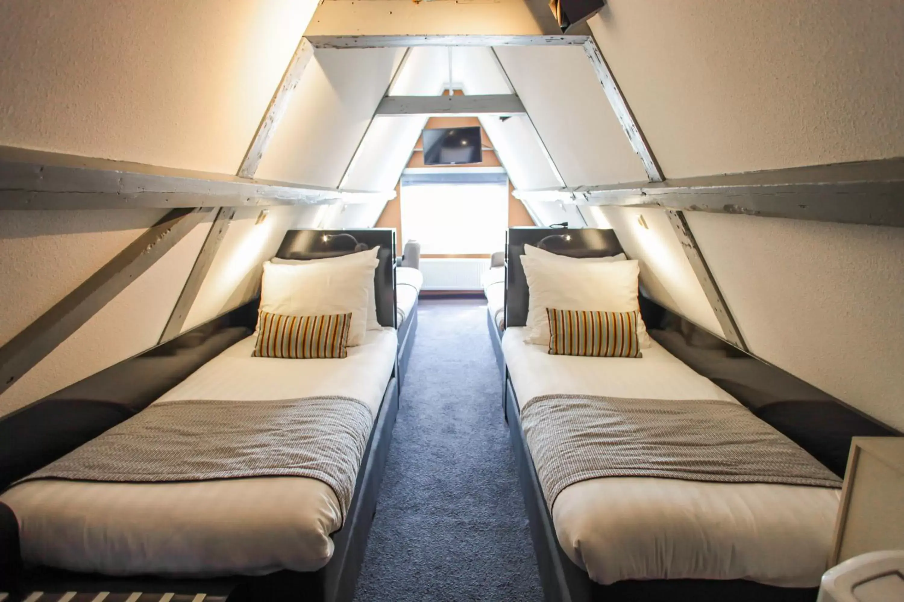 Attic Quad Room with Limited Elevator Access in Hotel Mansion Attic Quad Room with Limited Elevator Access in Hotel Mansion