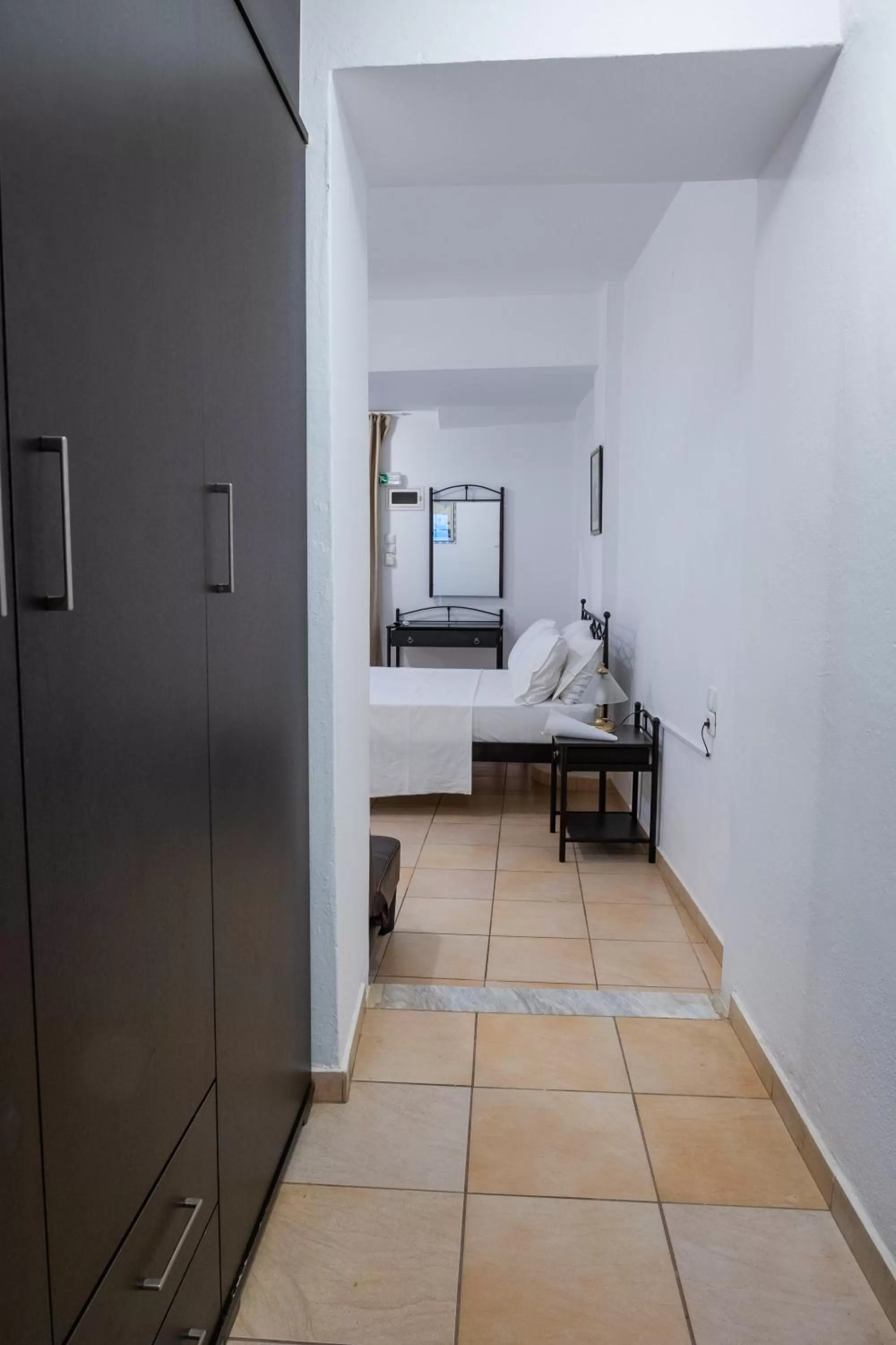 Bed in Polydoros Appartments