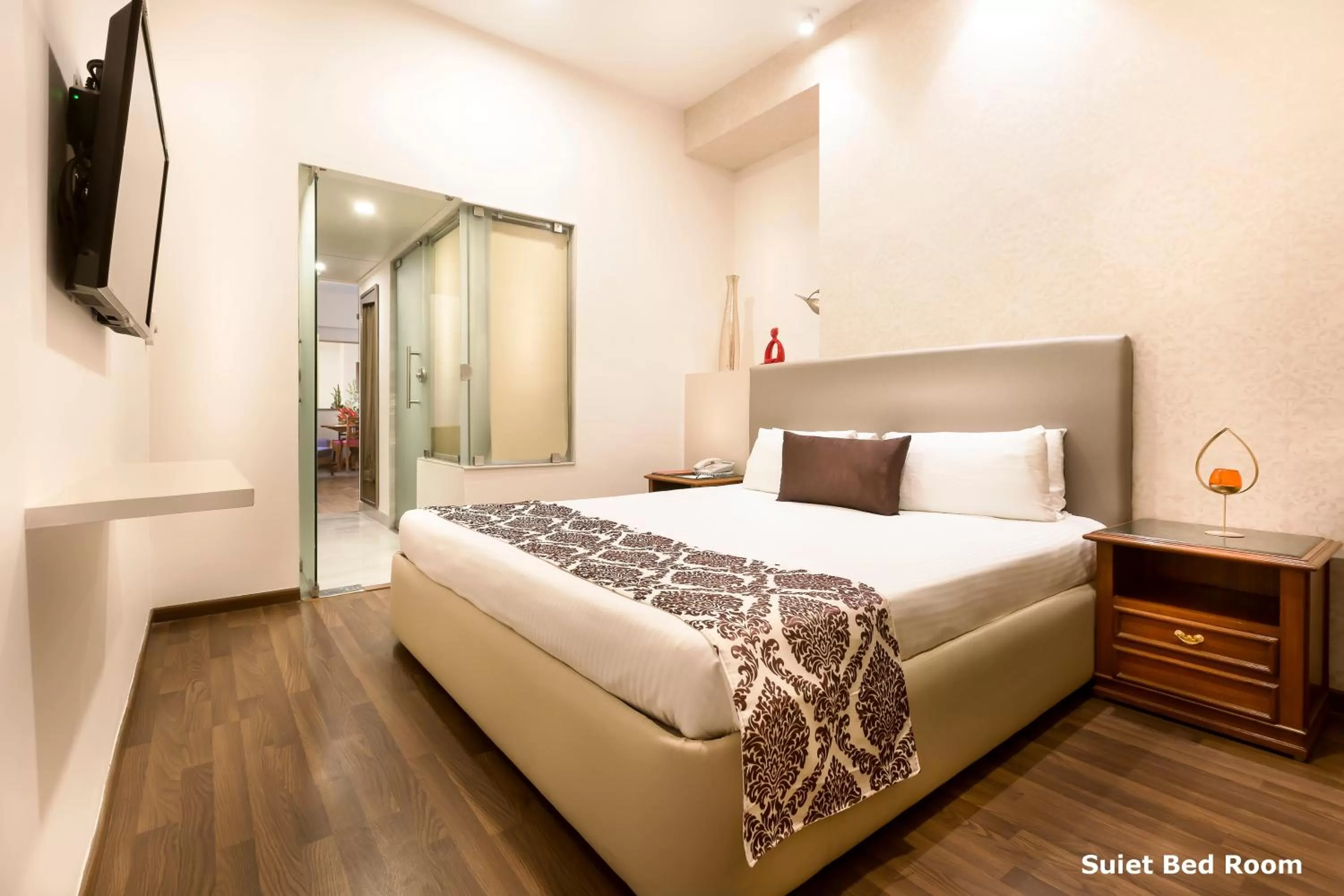 Bed in Regency Kanchipuram by GRT Hotels