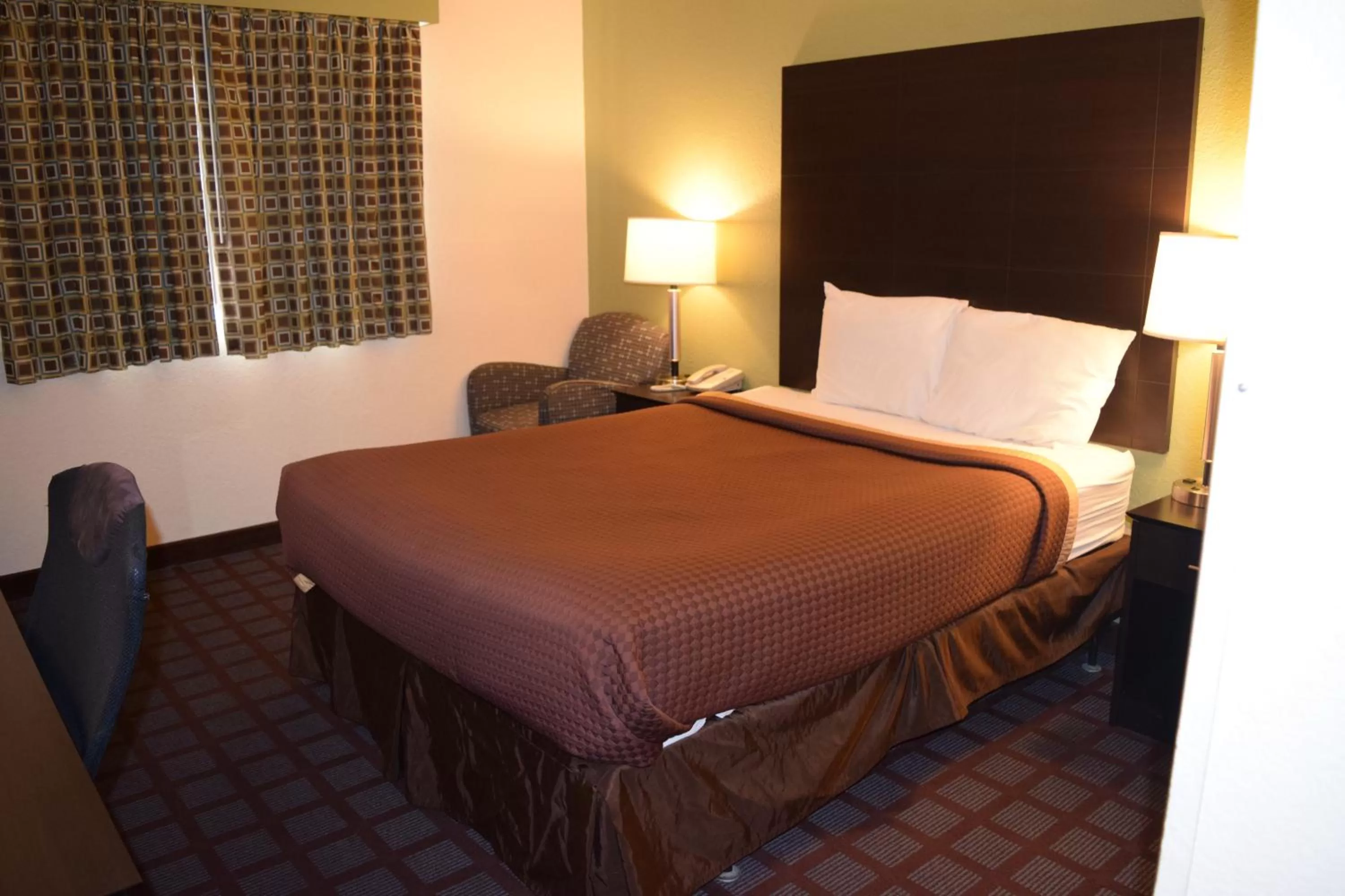 Bed in Super 8 by Wyndham Saginaw