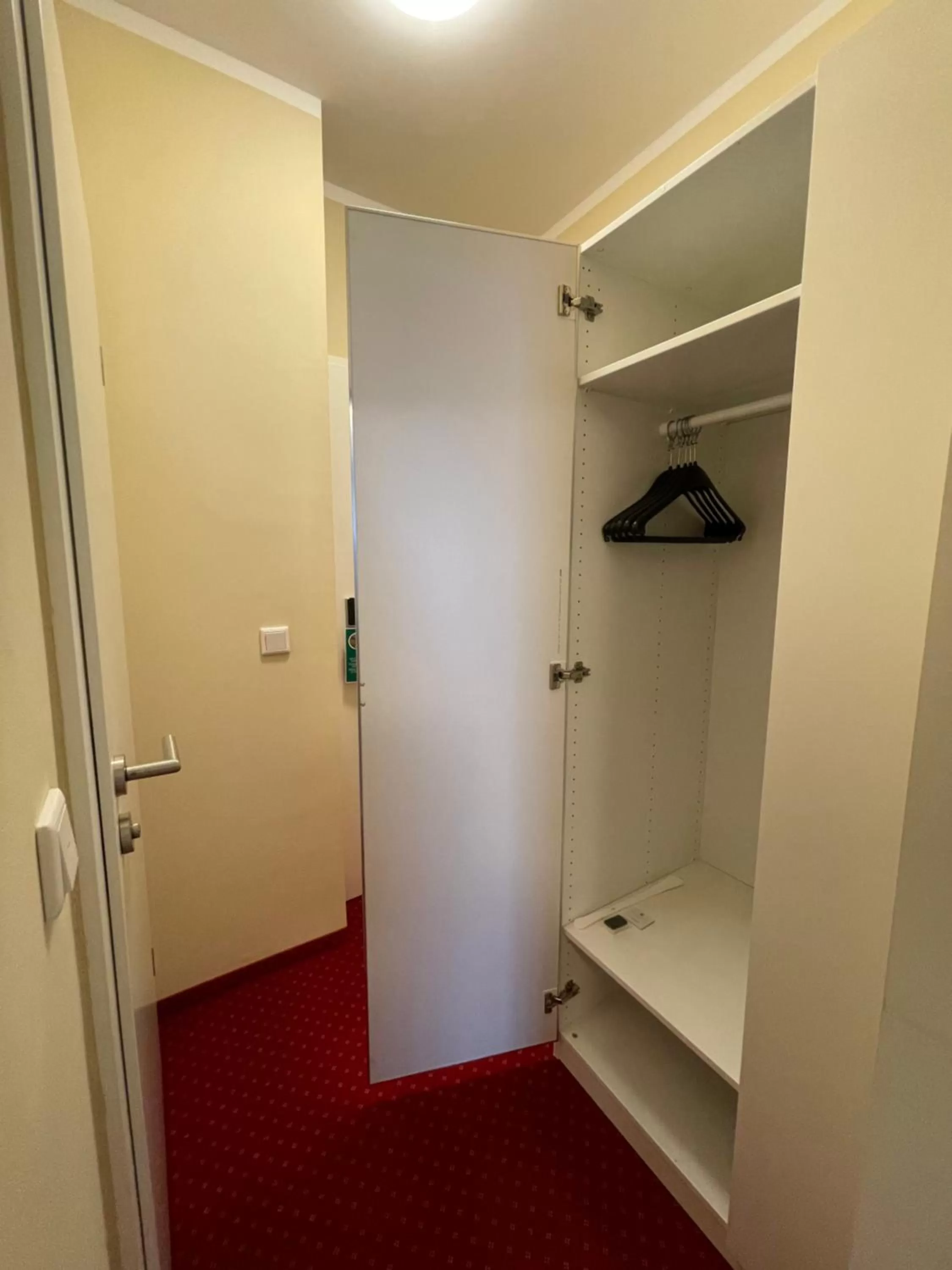 wardrobe in Palm Premium Hotel & Apartments