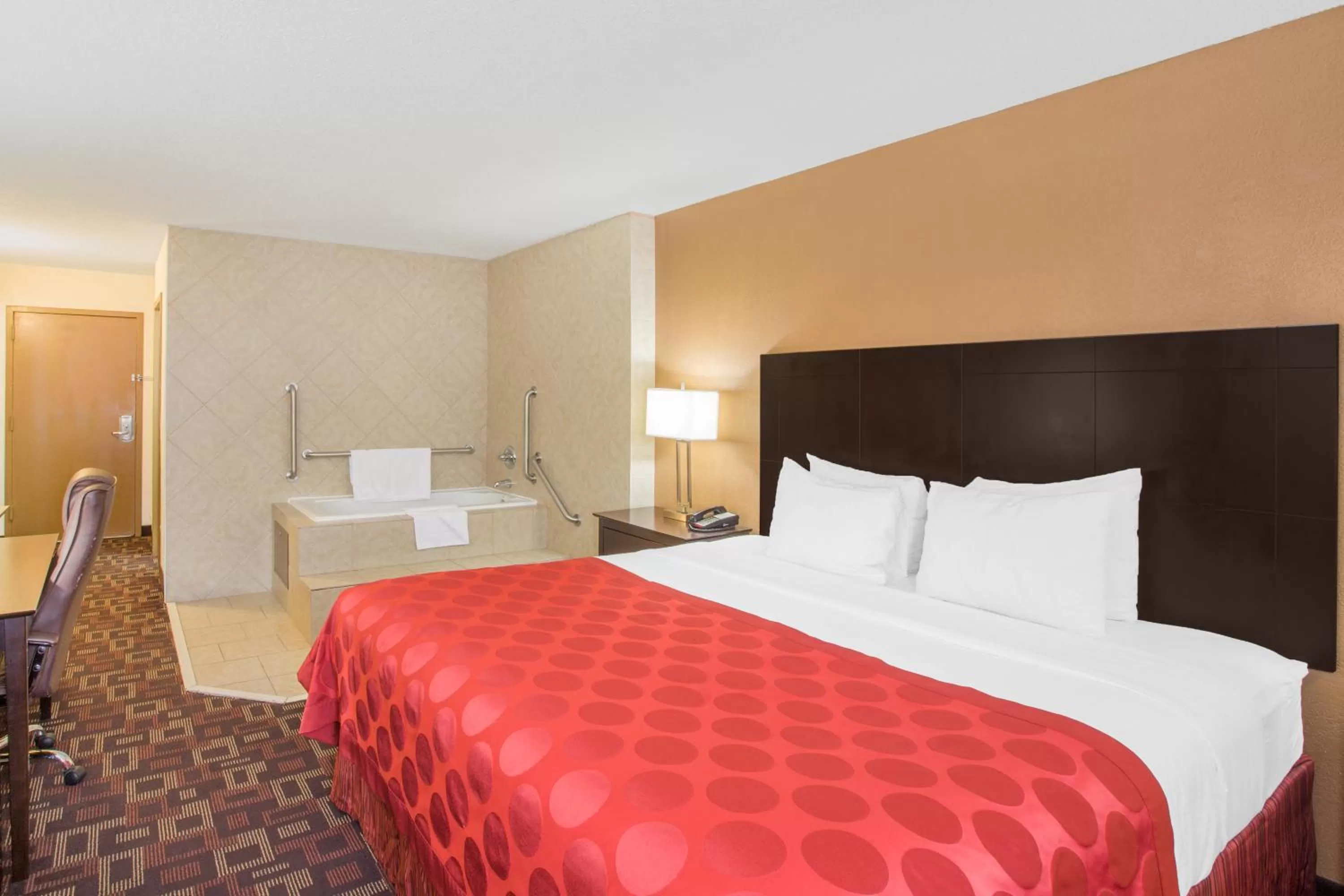 Bed in Ramada by Wyndham Tulsa