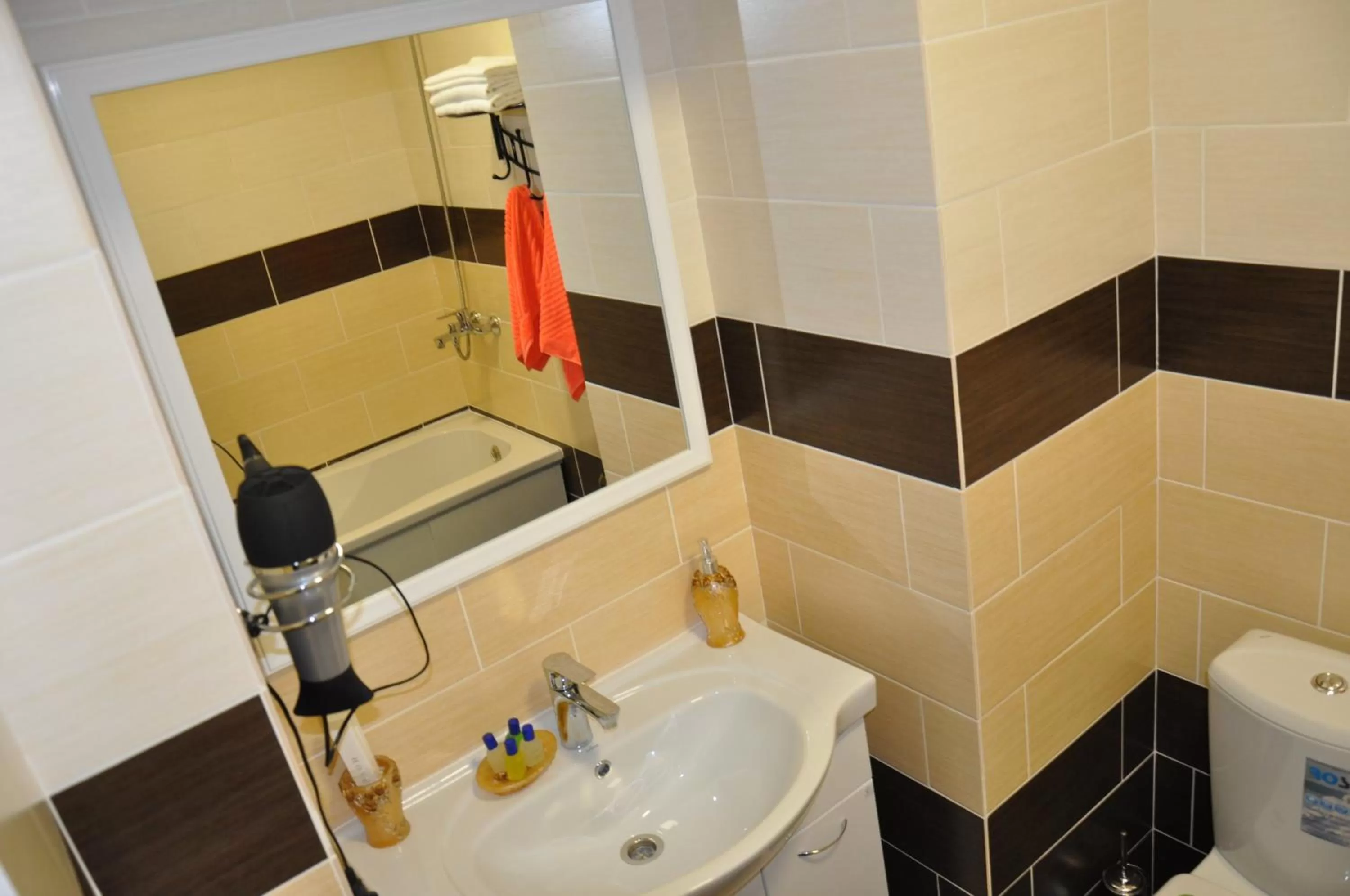 Bathroom in Astina Hotel