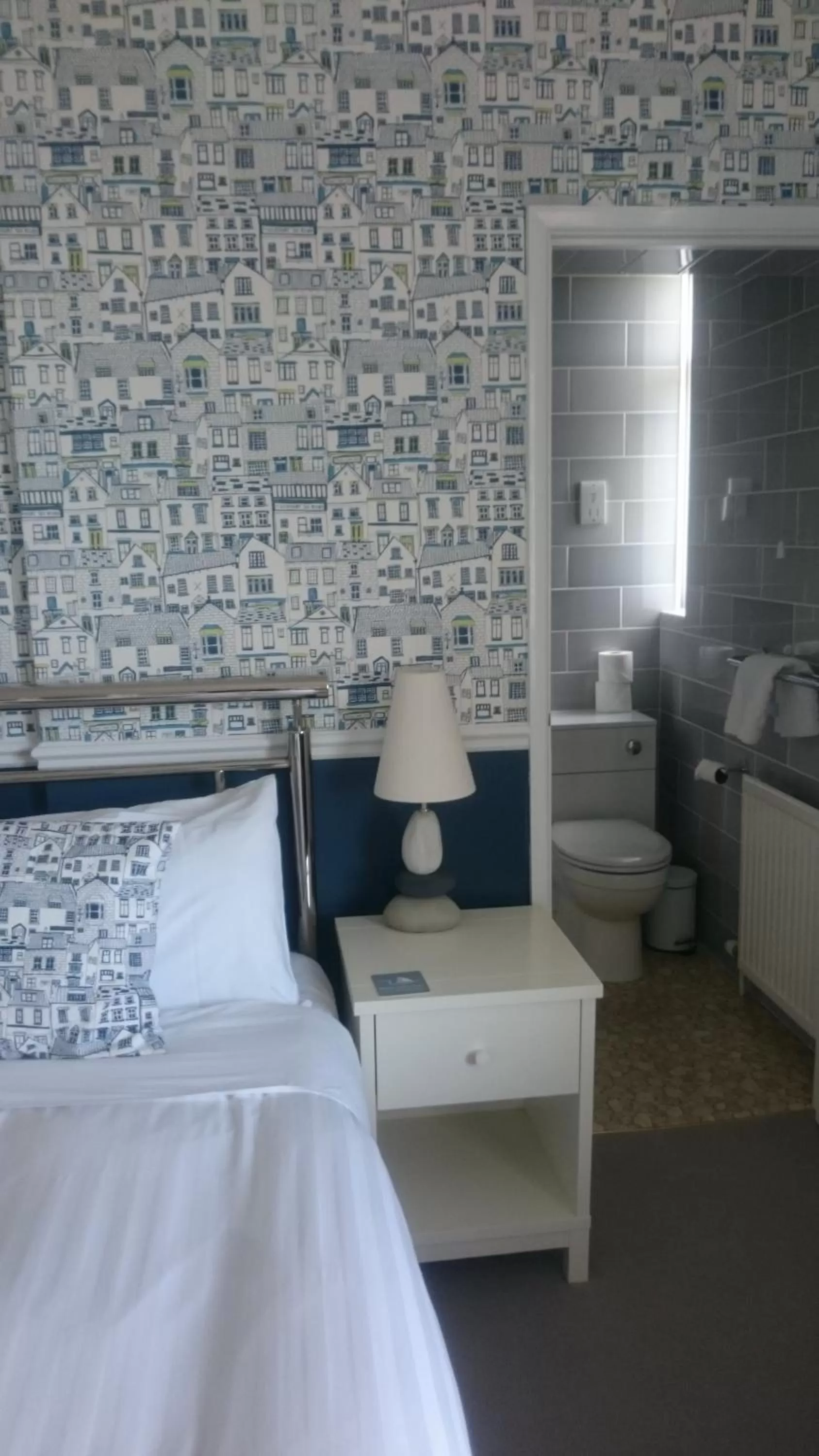 Bed in The White Lodge Hotel