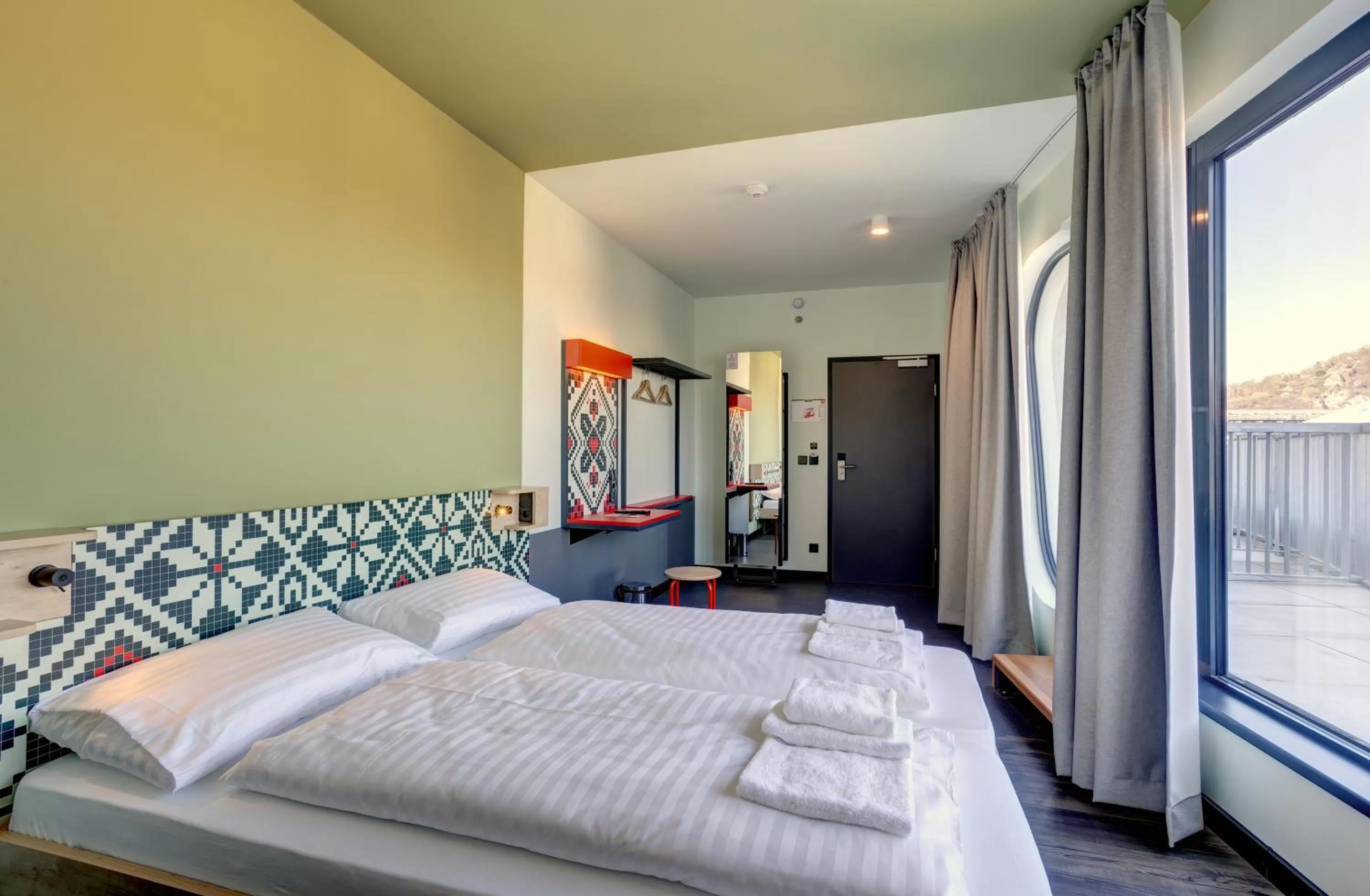 Photo of the whole room, Bed in MEININGER Budapest Great Market Hall