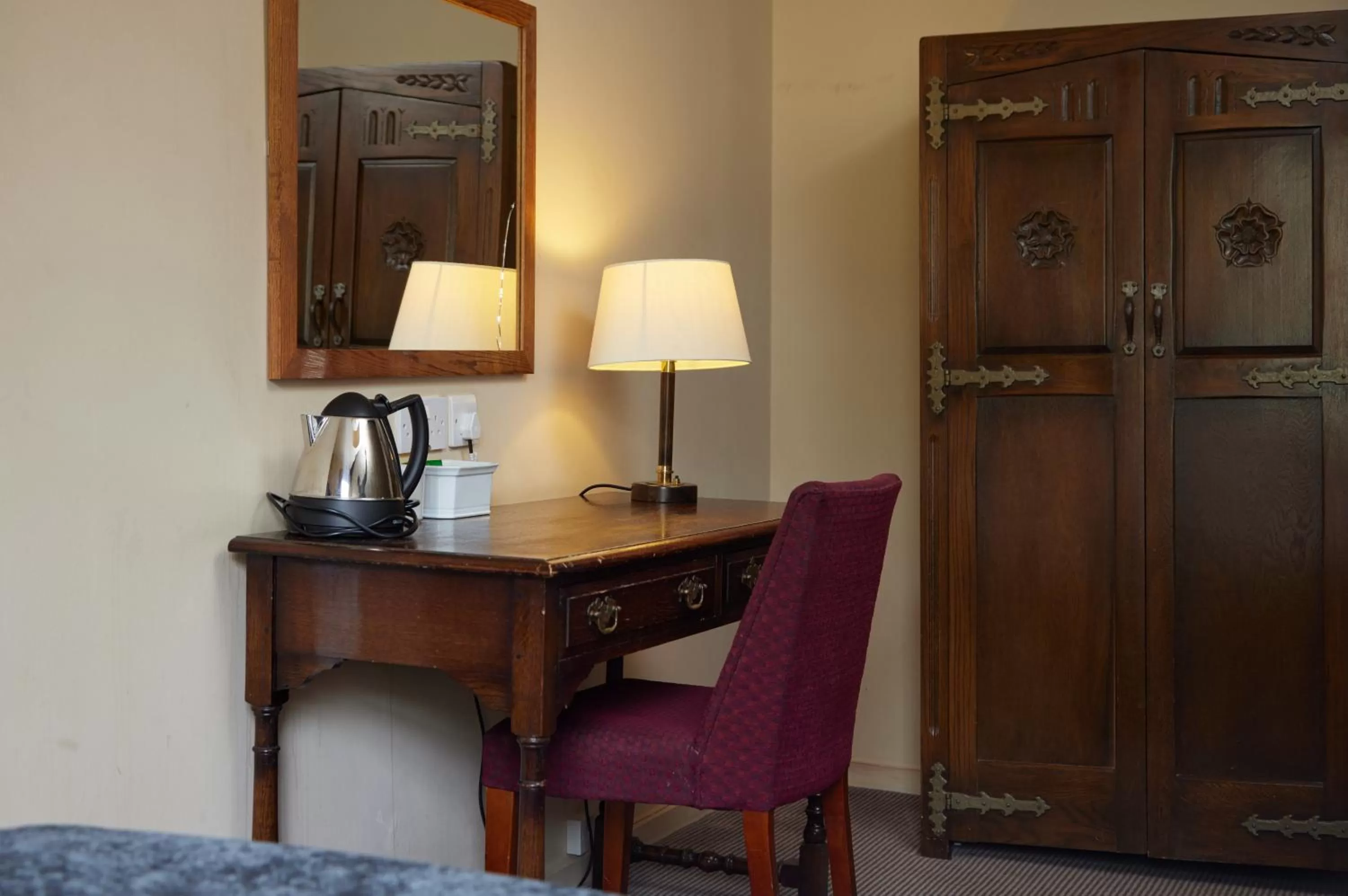 Seating area in Bell by Greene King Inns