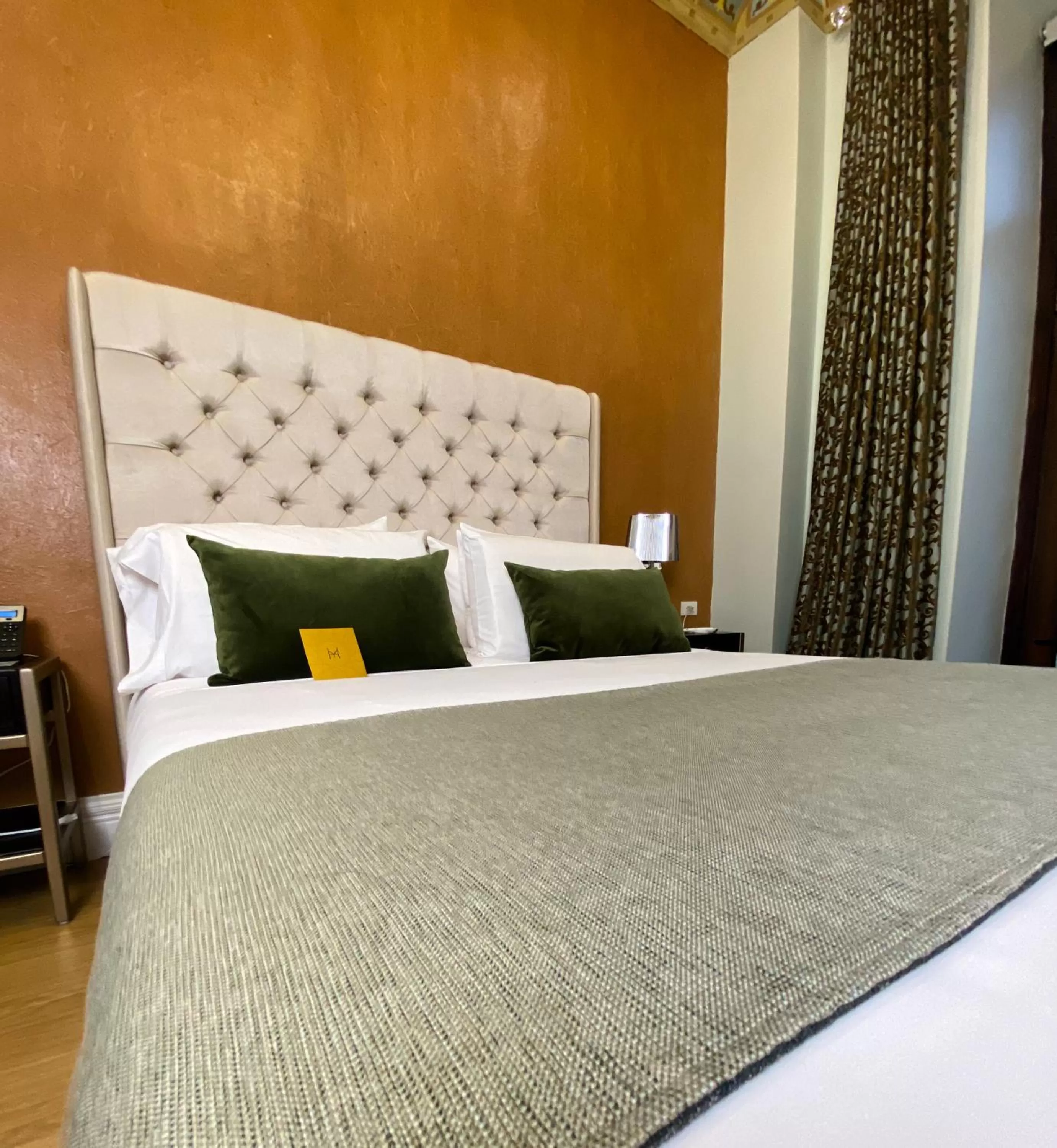 Bed in Itza Hotel Boutique Internacional