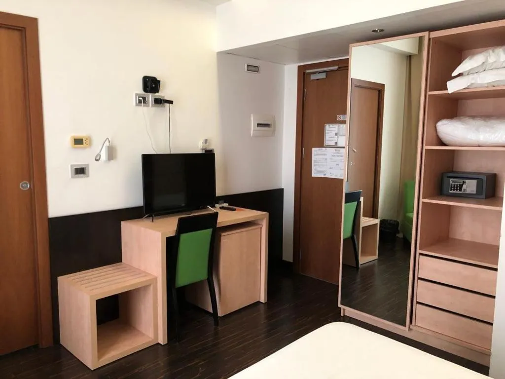 Bed in Hotel Cimarosa