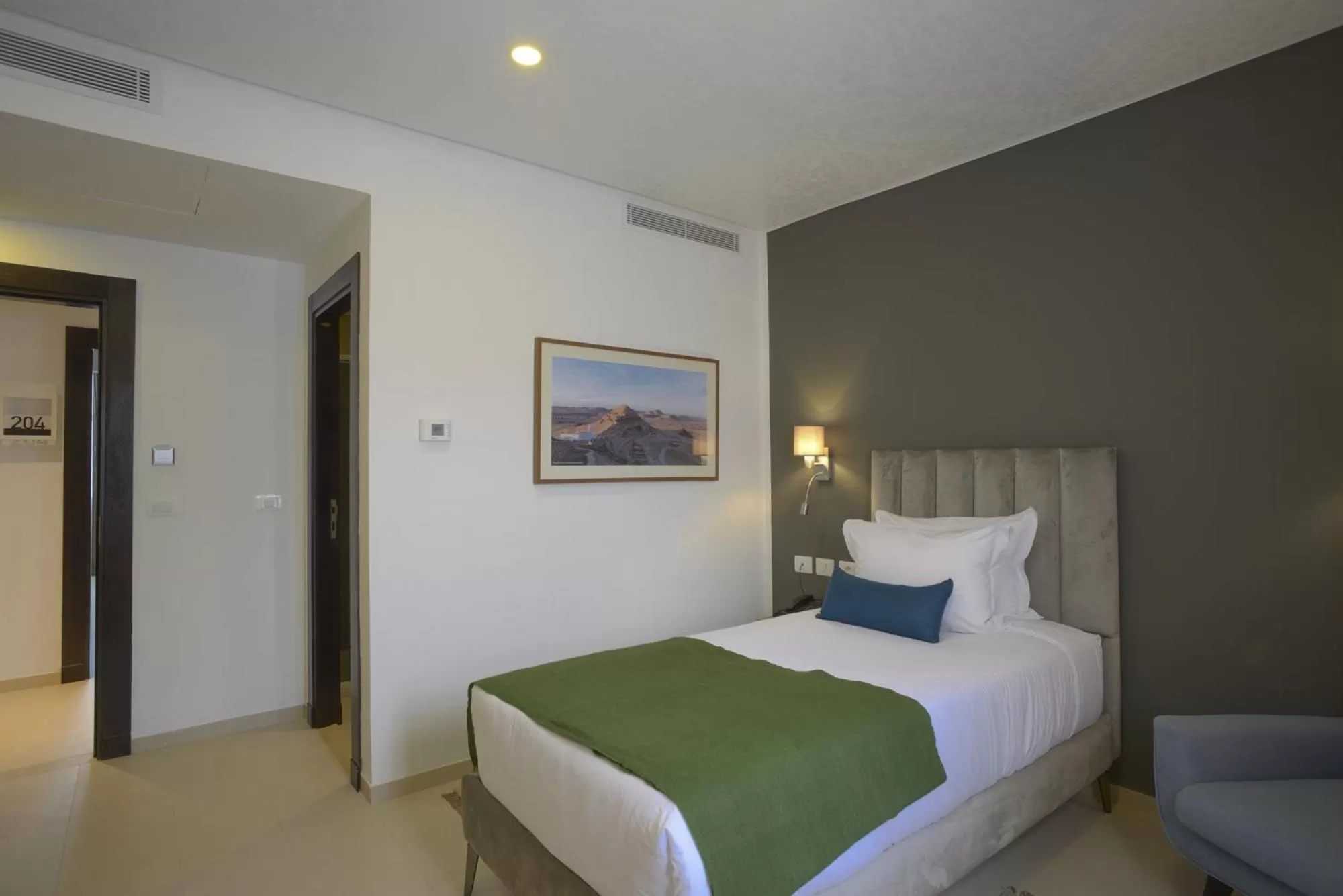 Photo of the whole room, Bed in MAIA HOTEL SUITES