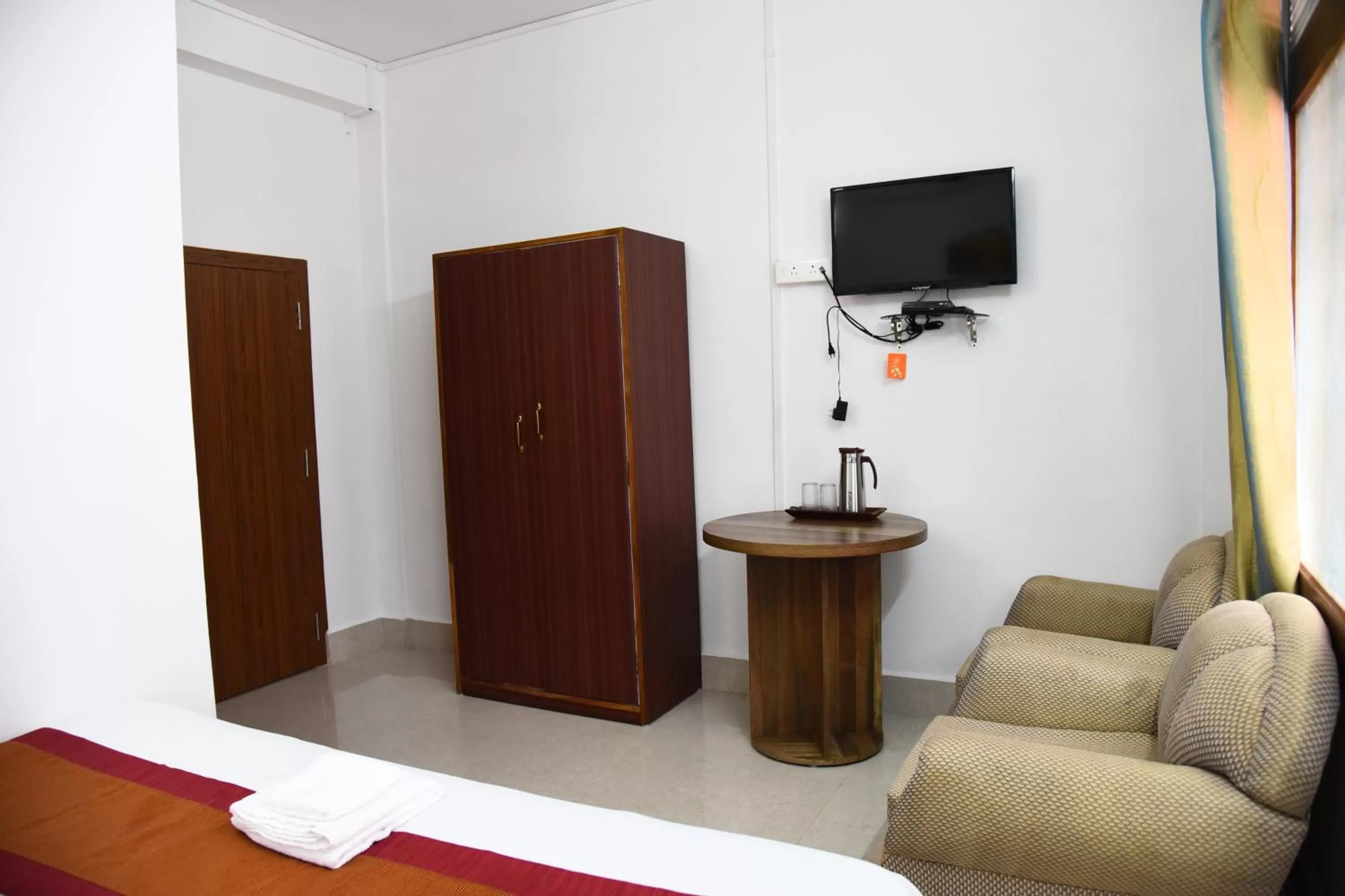 Seating area, Bed in PHIBHA VILLA